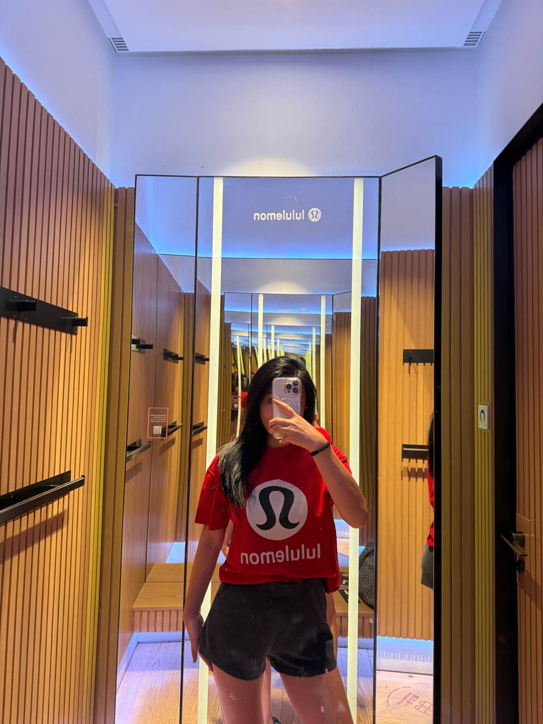 In store shootingNew Year is boomingRed T-shirt, bright colored poems in - Clothes