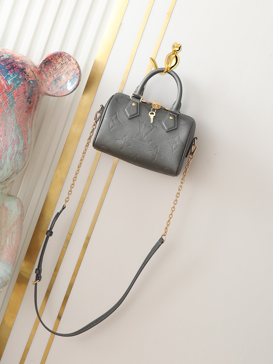 M12013 M46397 bolso tipo almohada speedy de cuero color pistola serie este bolso Speedy Bandoulière 20