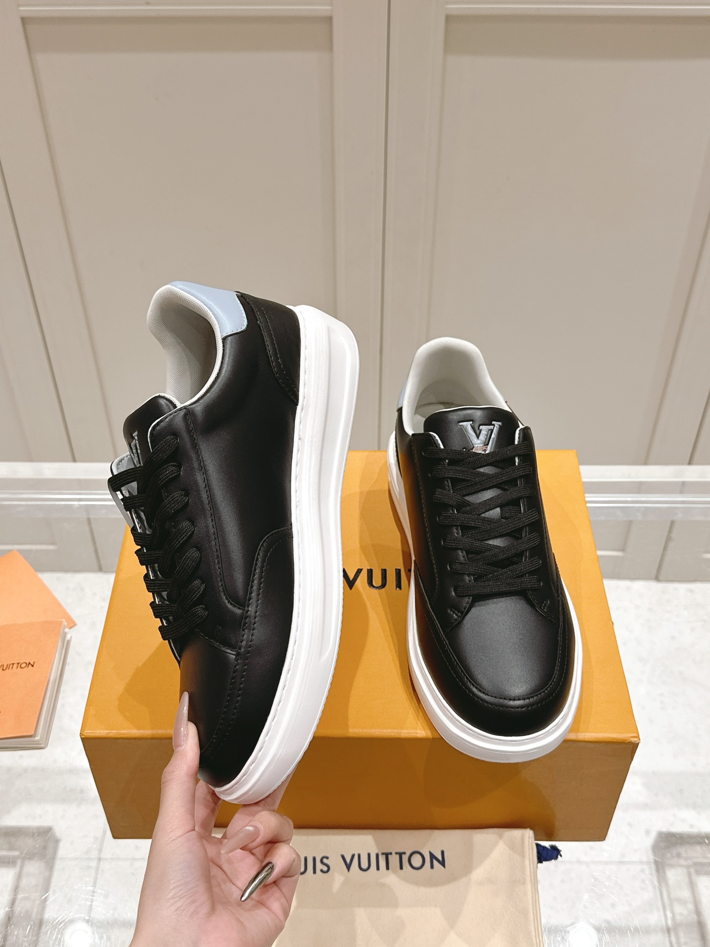 Louis Vuitton Black Leather Casual Sneakers with Embroidered Logo Details 5 i1740738412 7411 5