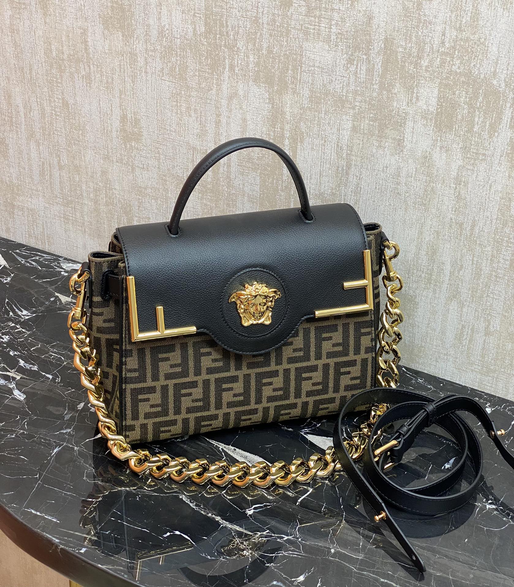 Fendi The most popular joint brand of the century, the versatile handbag can be carried by hand or worn cross-body using the interchangeable chai