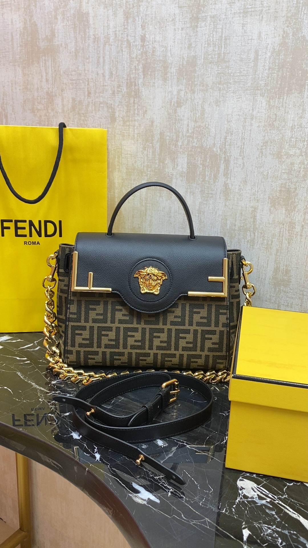 Fendi The most popular joint brand of the century, the versatile handbag can be carried by hand or worn cross-body using the interchangeable chai