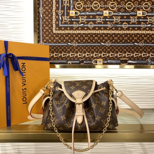 Louis Vuitton Odyssee Monogram Canvas Bag with Chain Accent and Side Pockets 1 Louis Vuitton Odyssee Monogram Canvas Bag with Chain Accent and Side Pockets