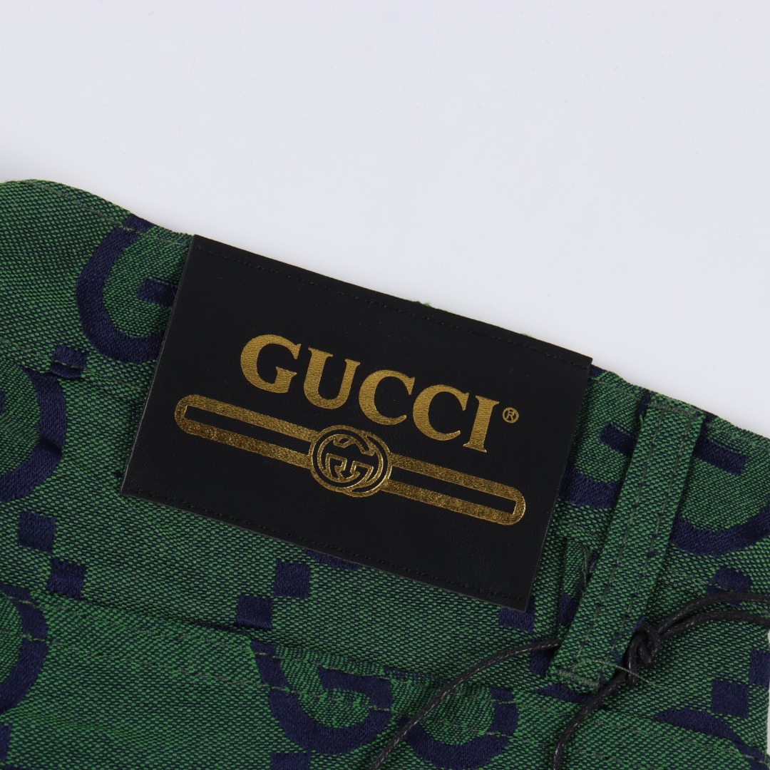GUCCI 古驰 GC 25SS 褶皱皮标大提花短裤 卡其/绿色