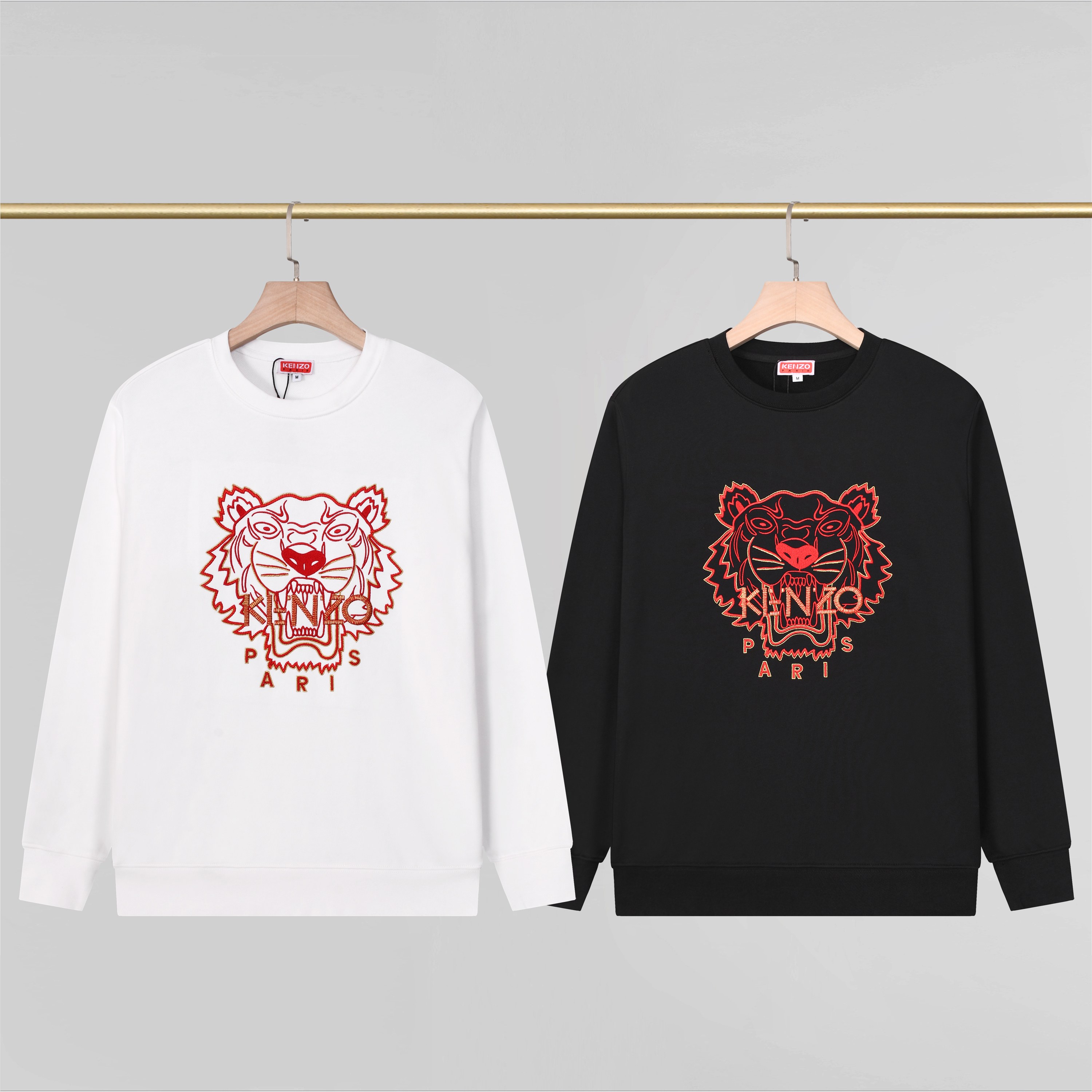P100 Sudadera con cuello redondo de kenzo con cabeza de tigre. Colores: negro, blanco. Tallas: M-XXL. Tejido:…
