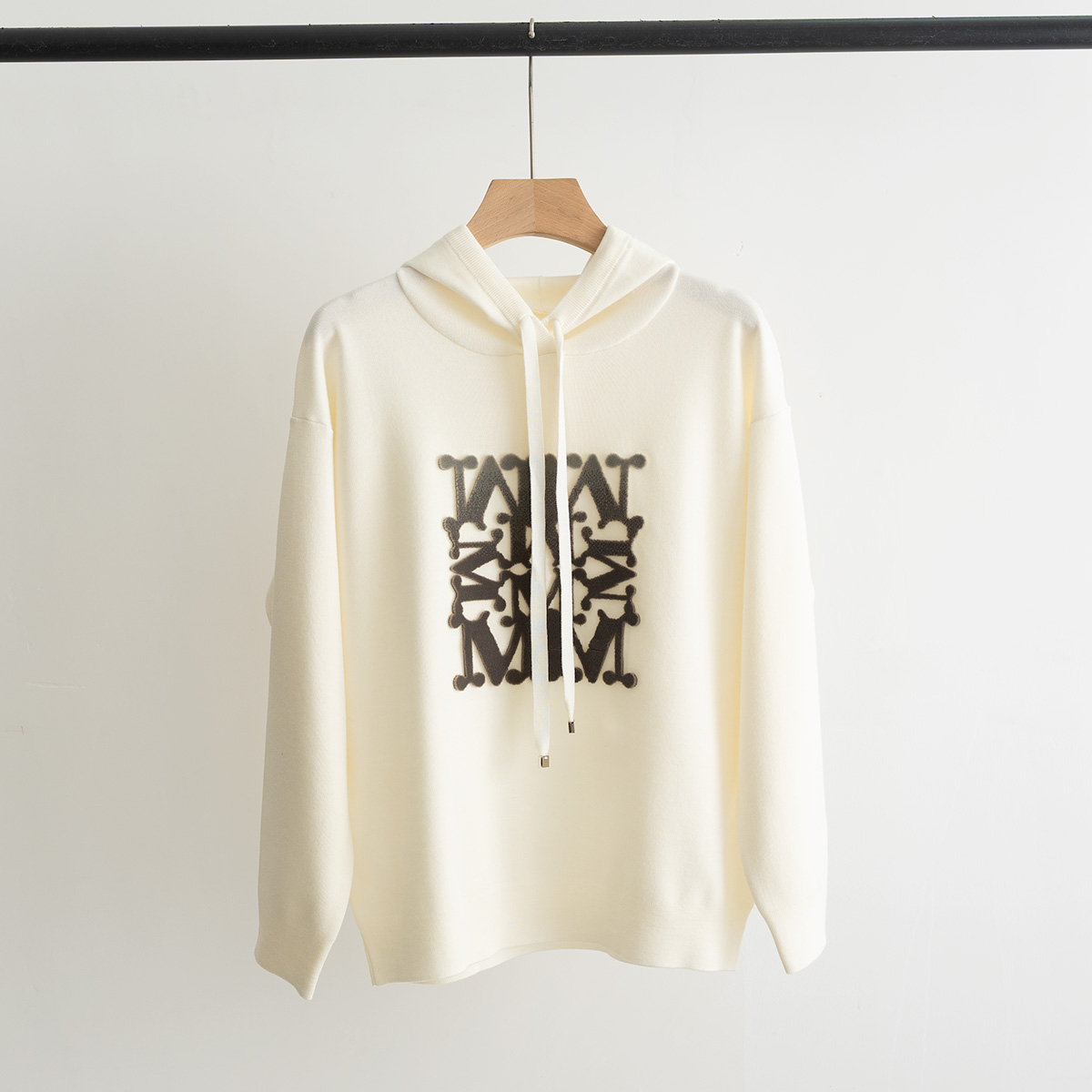 Sweat à capuche Max Mara en maille jacquard avec logo brodé et cordon de serrage.