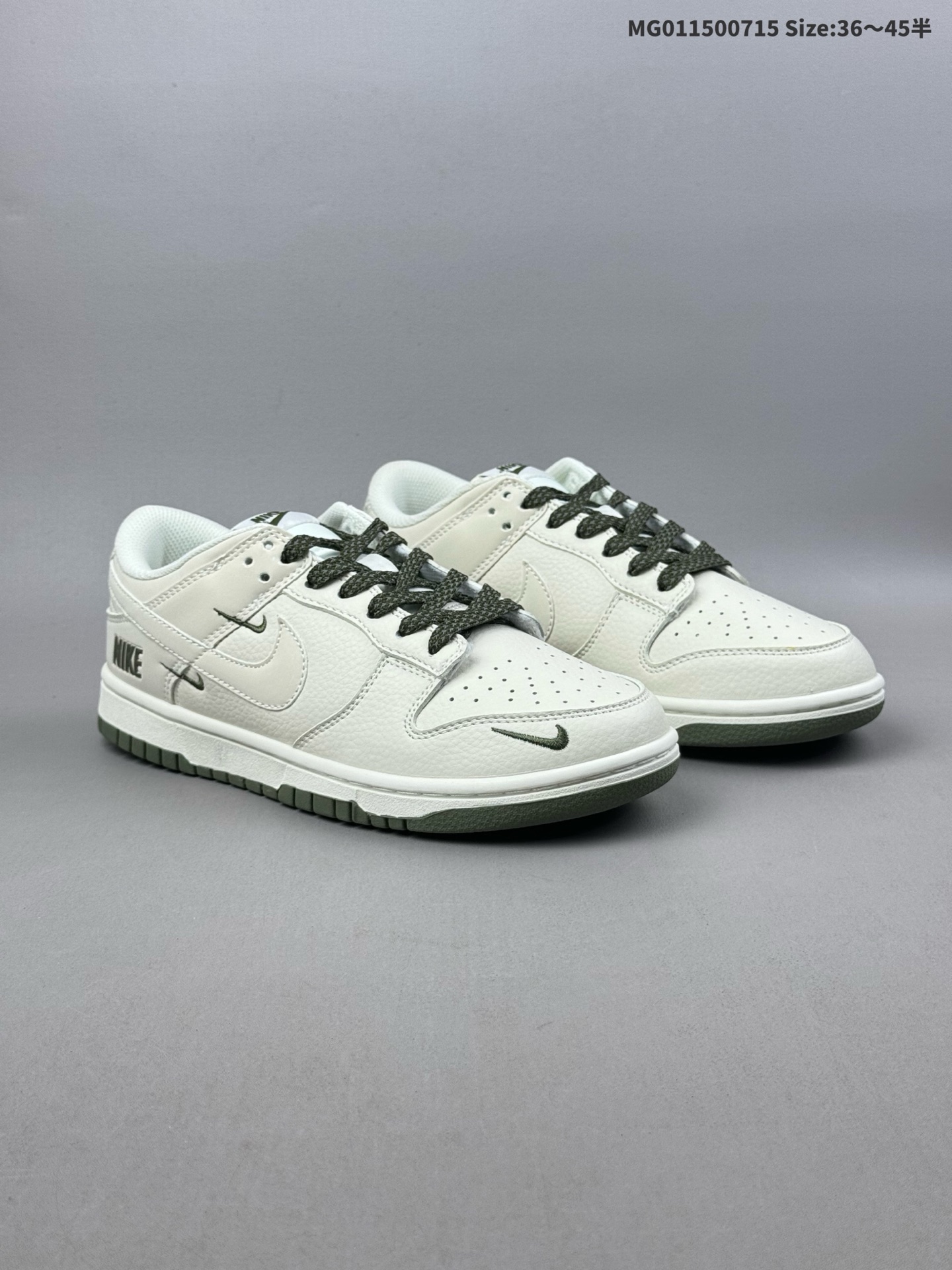 (36-45半) [定制球鞋] Nike Dunk SB Low 耐克 SB 低帮 白绿 鞋身以白色作为主色调,搭配白色皮革框架覆盖层,使鞋款十分百搭,同时Swoosh Logo的装饰贴片使用了3M反光打造,使鞋子更为炫酷.鞋舌绣标、两侧的Swoosbh Logo和后跟的装饰皮革都是用白色制作,鞋舌是网眼布材料以及绿色Nike Swoosh Logom呈现,整体就是小白鞋设计,鞋头处侧边迷你Nike Swoosh Logo采用绿色刺绣点缀,后跟印有绿色Nike字样,彰显联名身份.最后以白色中底搭配绿色橡胶外底完善整体设计收尾. 货号:NK5639-323 ID:MG011500715 半
