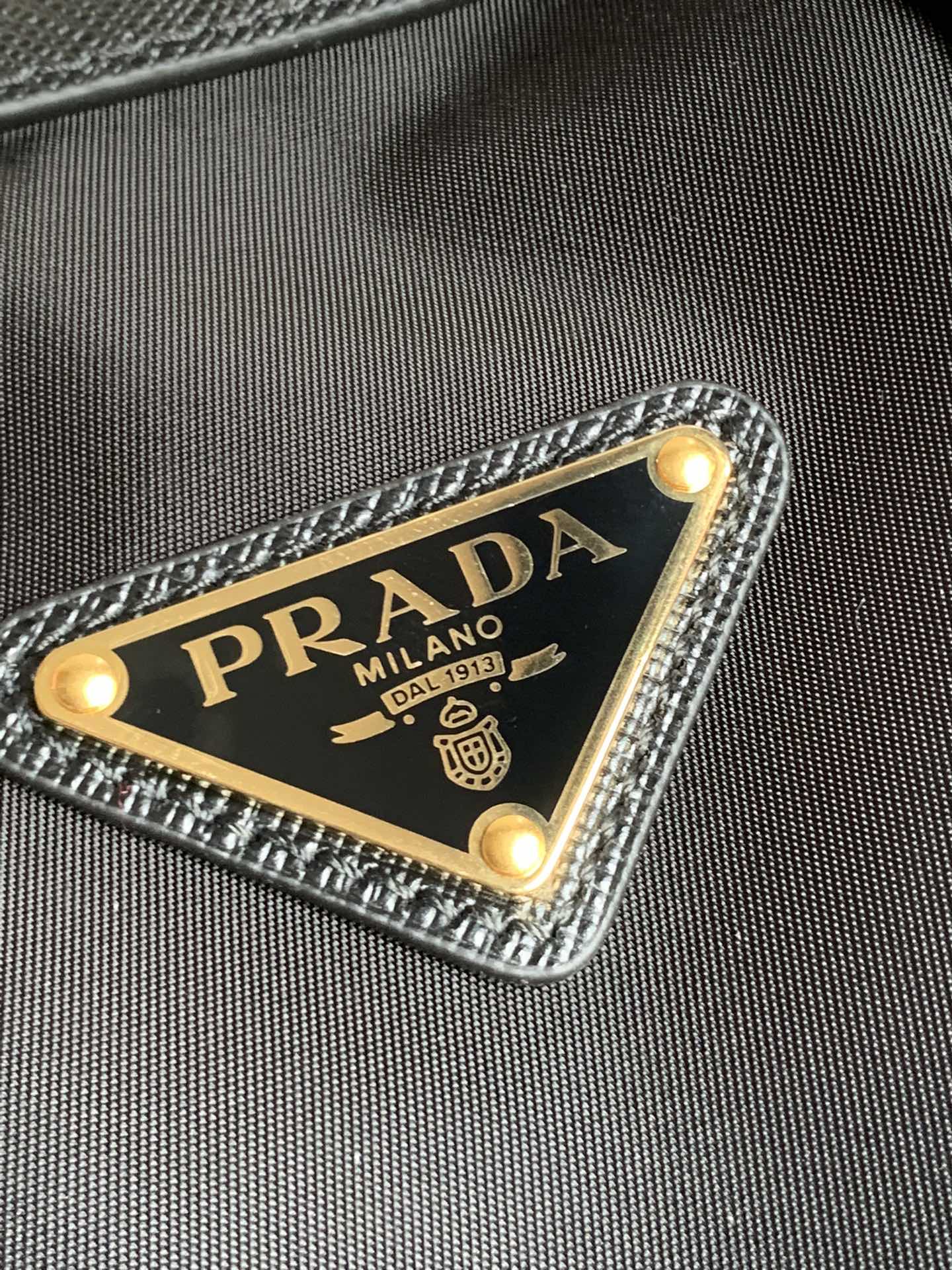 Prada Here are the details