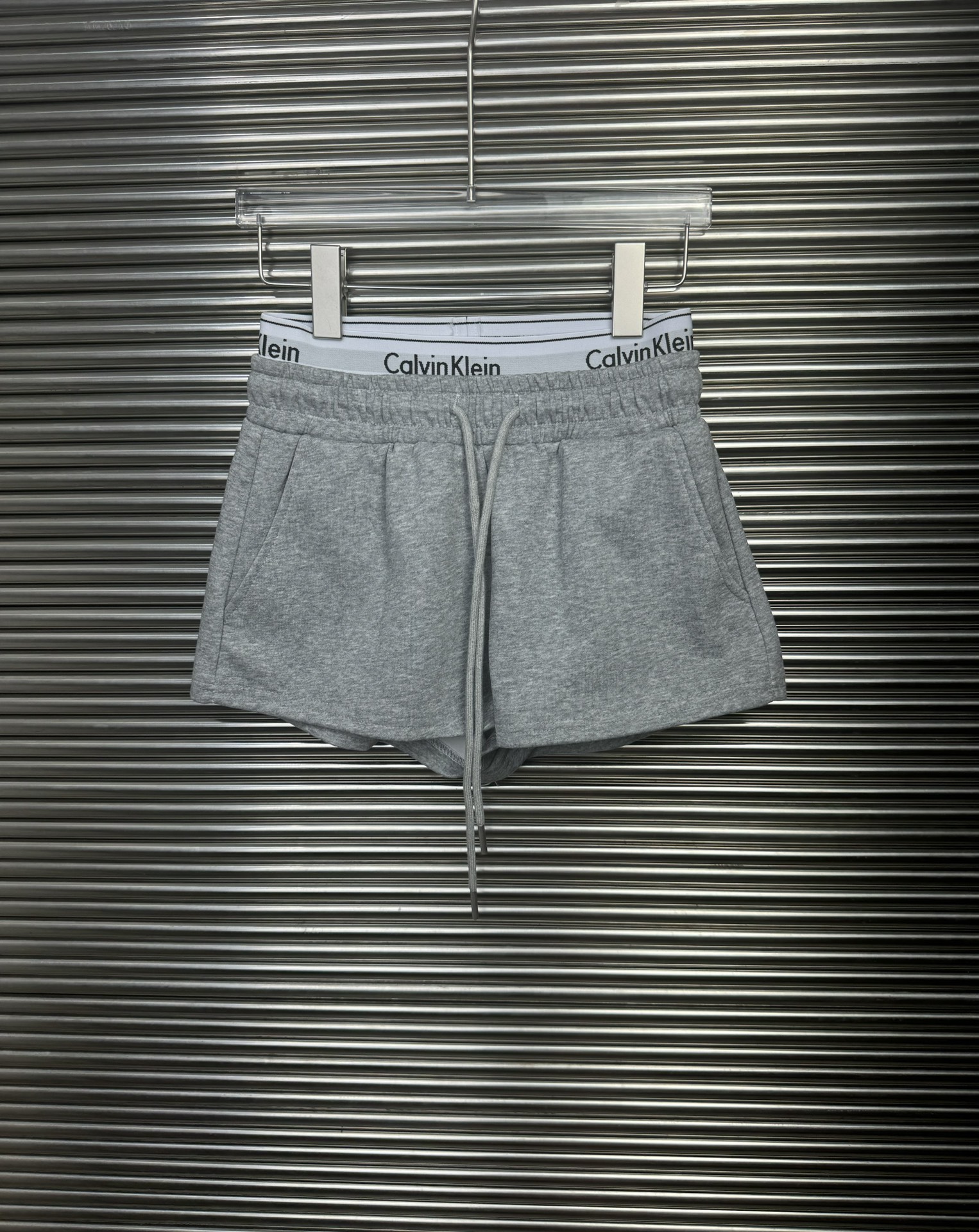 C.K. WEARING STYLISH AMERICAN SHORTS. COLOUR: BLACK GREY NUMBER: S M L SECTION NO. BA 818
