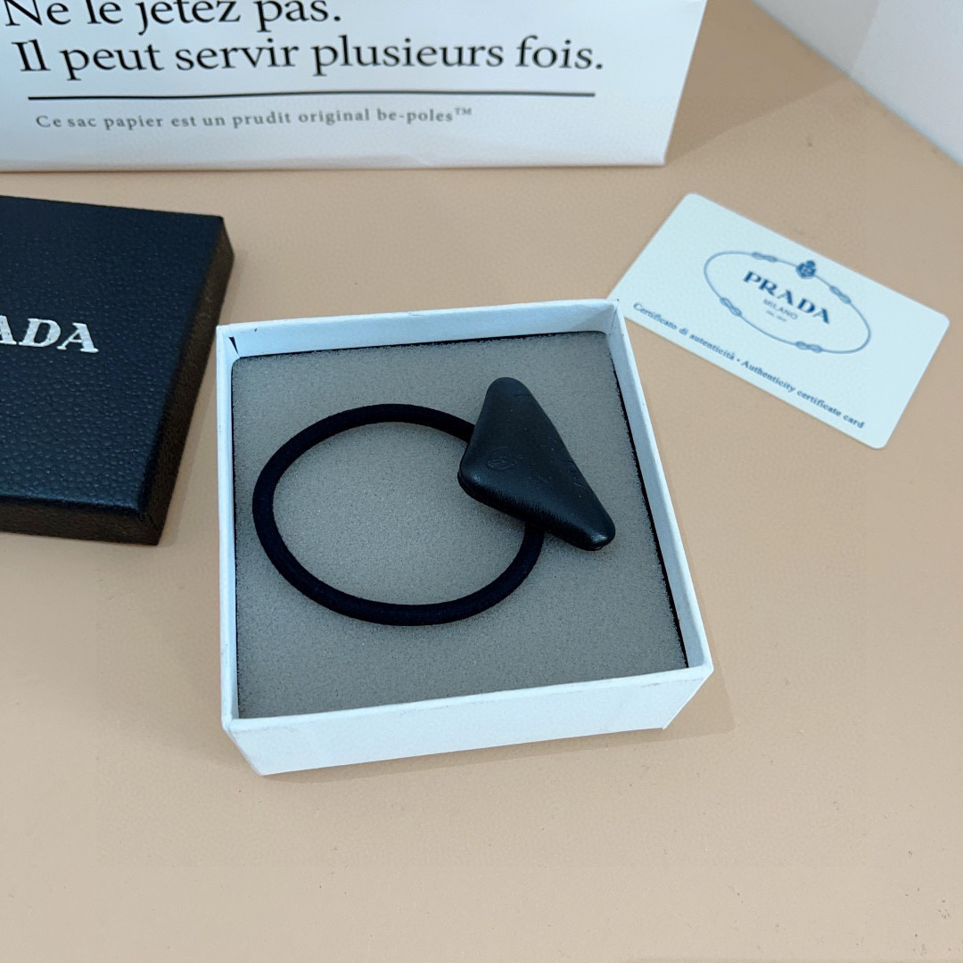 Stylish PRADA Red Hair Loops for Trendy High Ponytail Look with Comfortable and Stress-free Packaging. - 图片 1