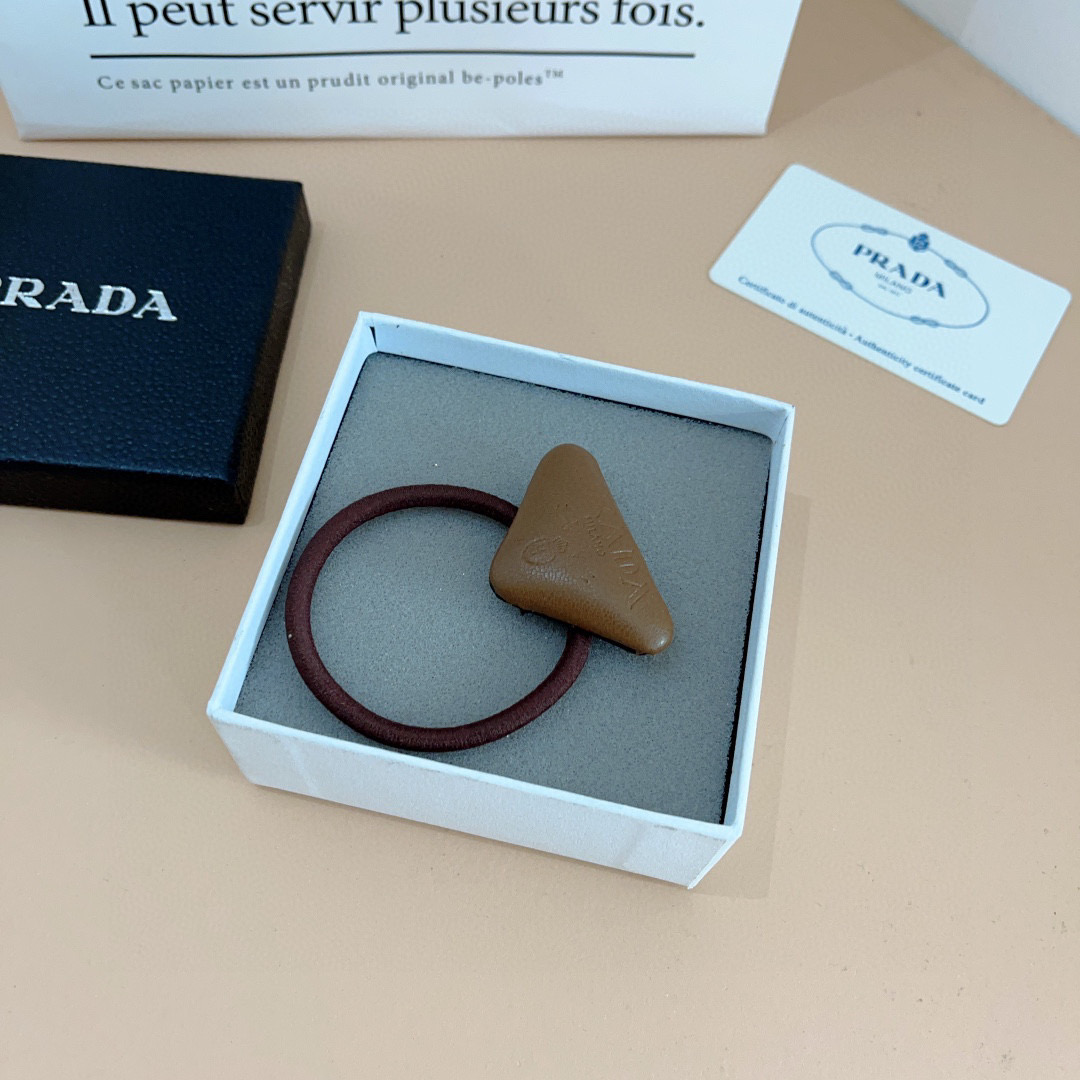 PRADA Red Hair Loops: Fashionable High Pony Tail Packaging for Stress-Free Comfort - 图片 1