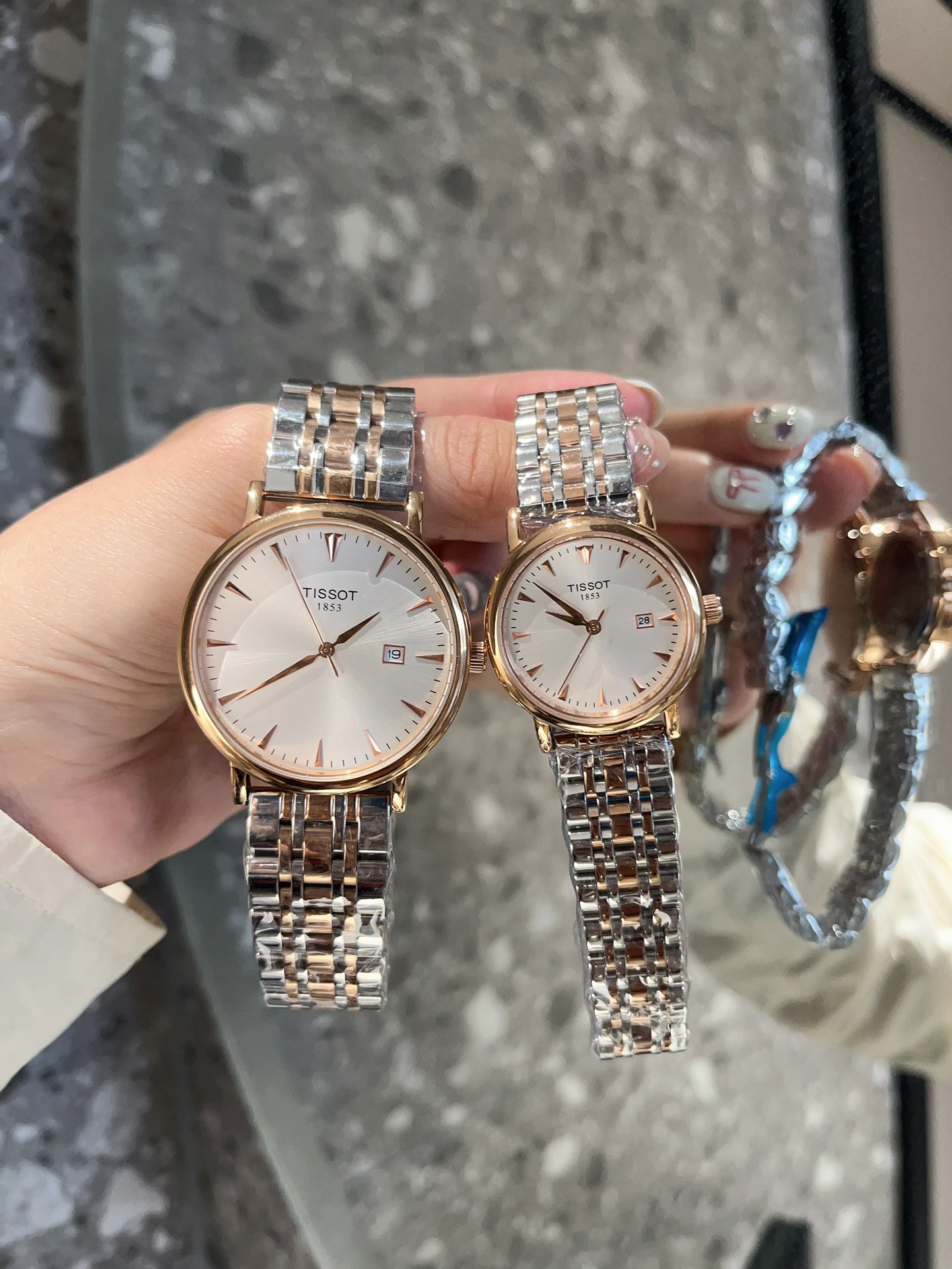 Tissot Couple Watch: White Steel Belt, Stone Core, 316L Steel, 40mm Men’s & 30mm Women’s.