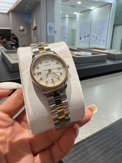Gucci G-Timeless Essentials Two-Tone Stainless Steel Women's Watch 1 Gucci G-Timeless Essentials Two-Tone Stainless Steel Women's Watch