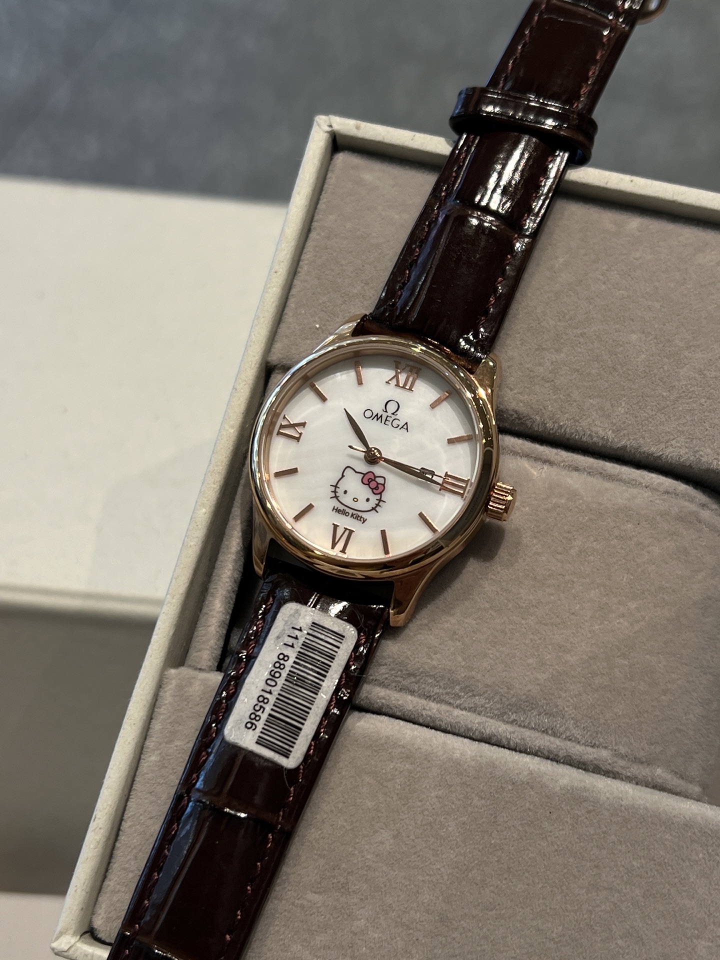 Omega De Ville Prestige Hello Kitty Dial silver or rose gold case, white dial, black or brown leather strap 34mm Women's Quartz