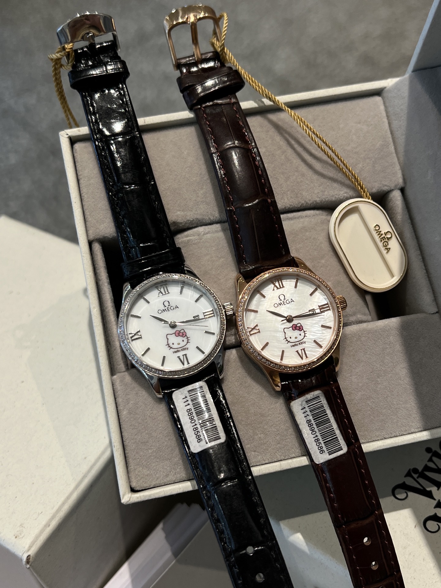 Omega De Ville Prestige Hello Kitty Dial silver or rose gold case, white dial, black or brown leather strap 34mm Women's Quartz