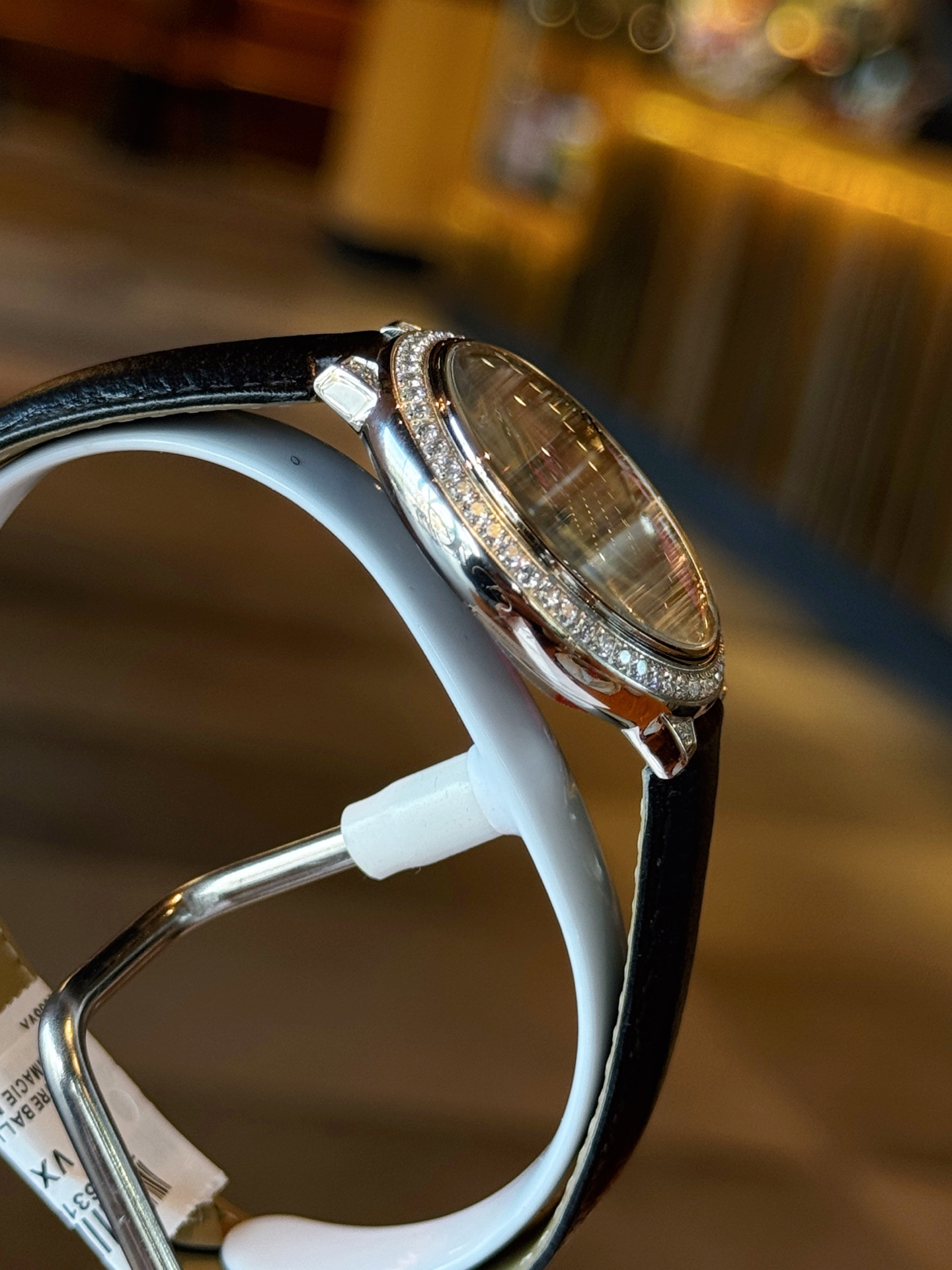 Cartier Ballon Bleu de Cartier white gold diamond-set case and bezel, mother-of-pearl diamond dial, black leather strap 36mm Women's Automatic