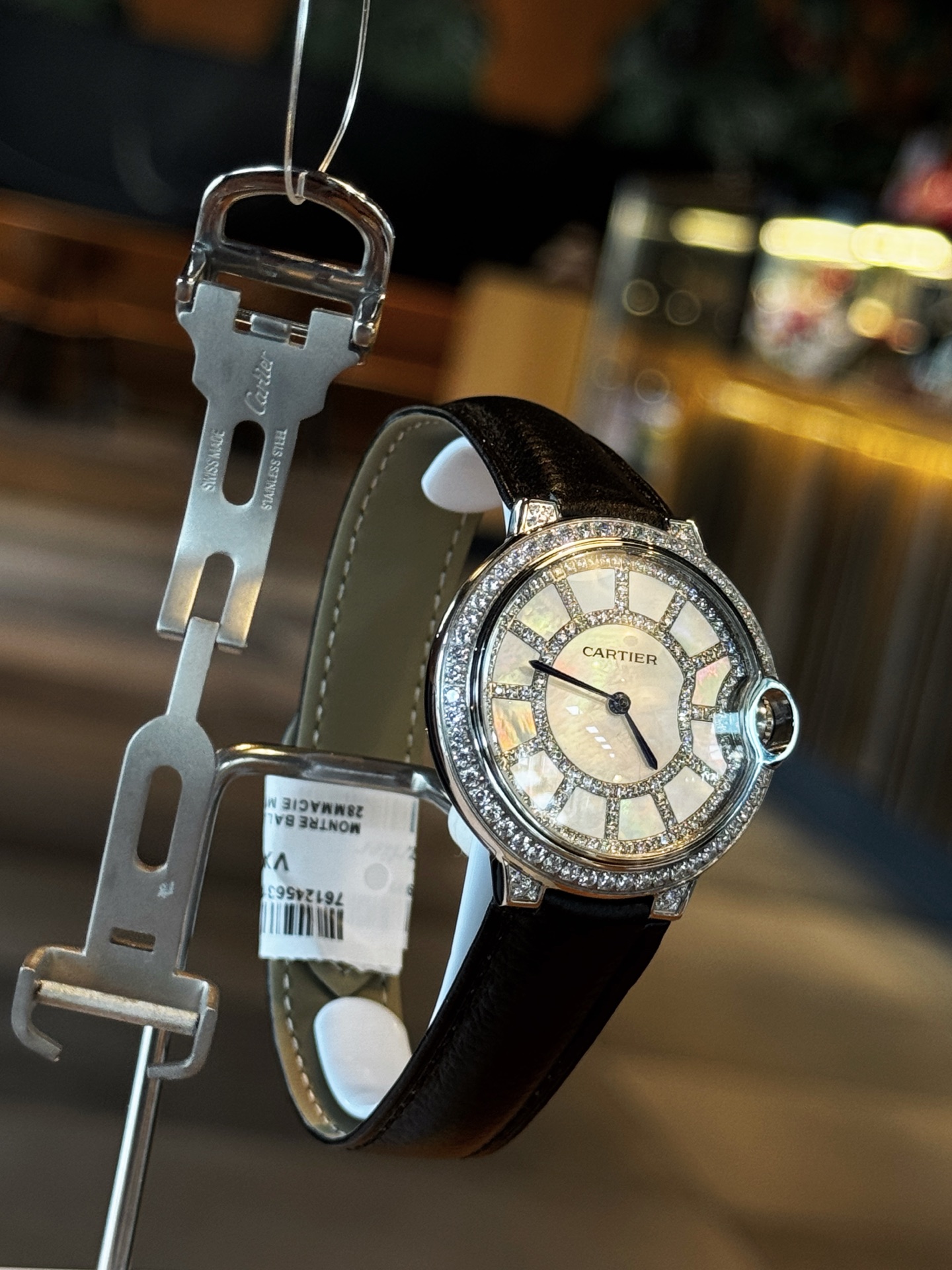 Cartier Ballon Bleu de Cartier white gold diamond-set case and bezel, mother-of-pearl diamond dial, black leather strap 36mm Women's Automatic