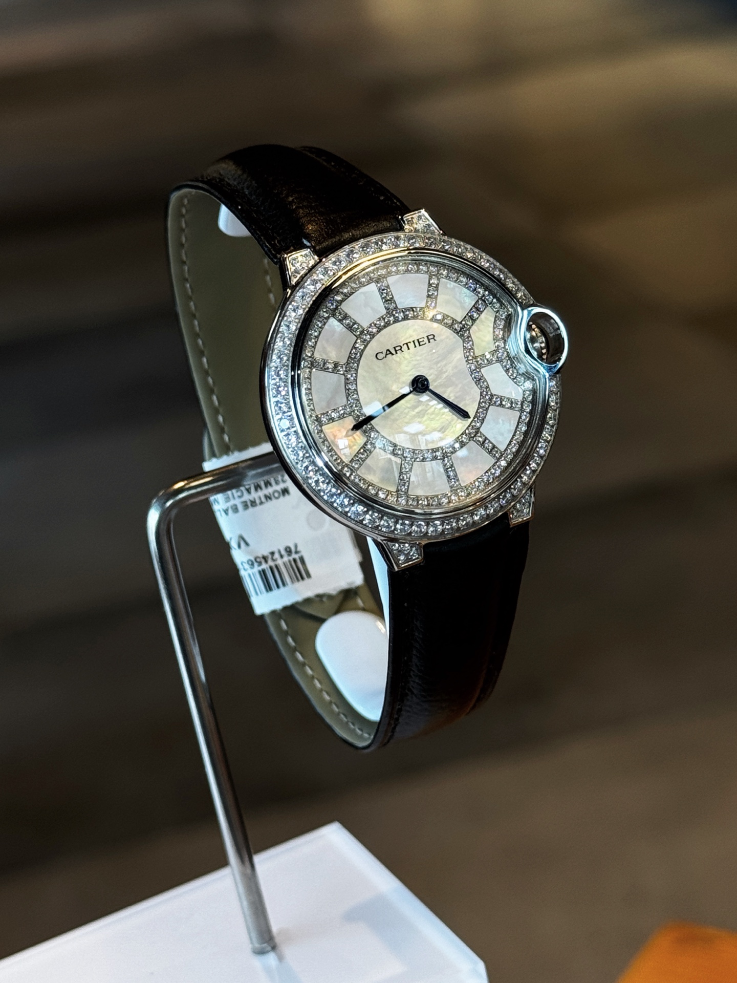 Cartier Ballon Bleu de Cartier white gold diamond-set case and bezel, mother-of-pearl diamond dial, black leather strap 36mm Women's Automatic