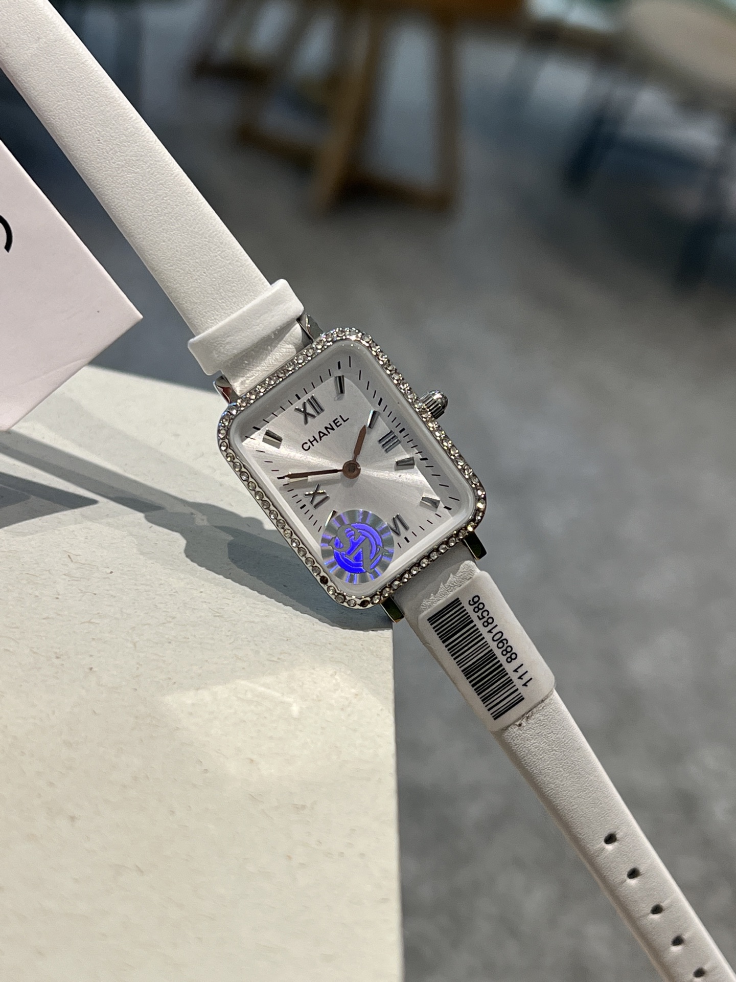 Chanel Premiere-style rectangular watch rose gold-tone case, white dial, black leather strap 26mm Women's Quartz