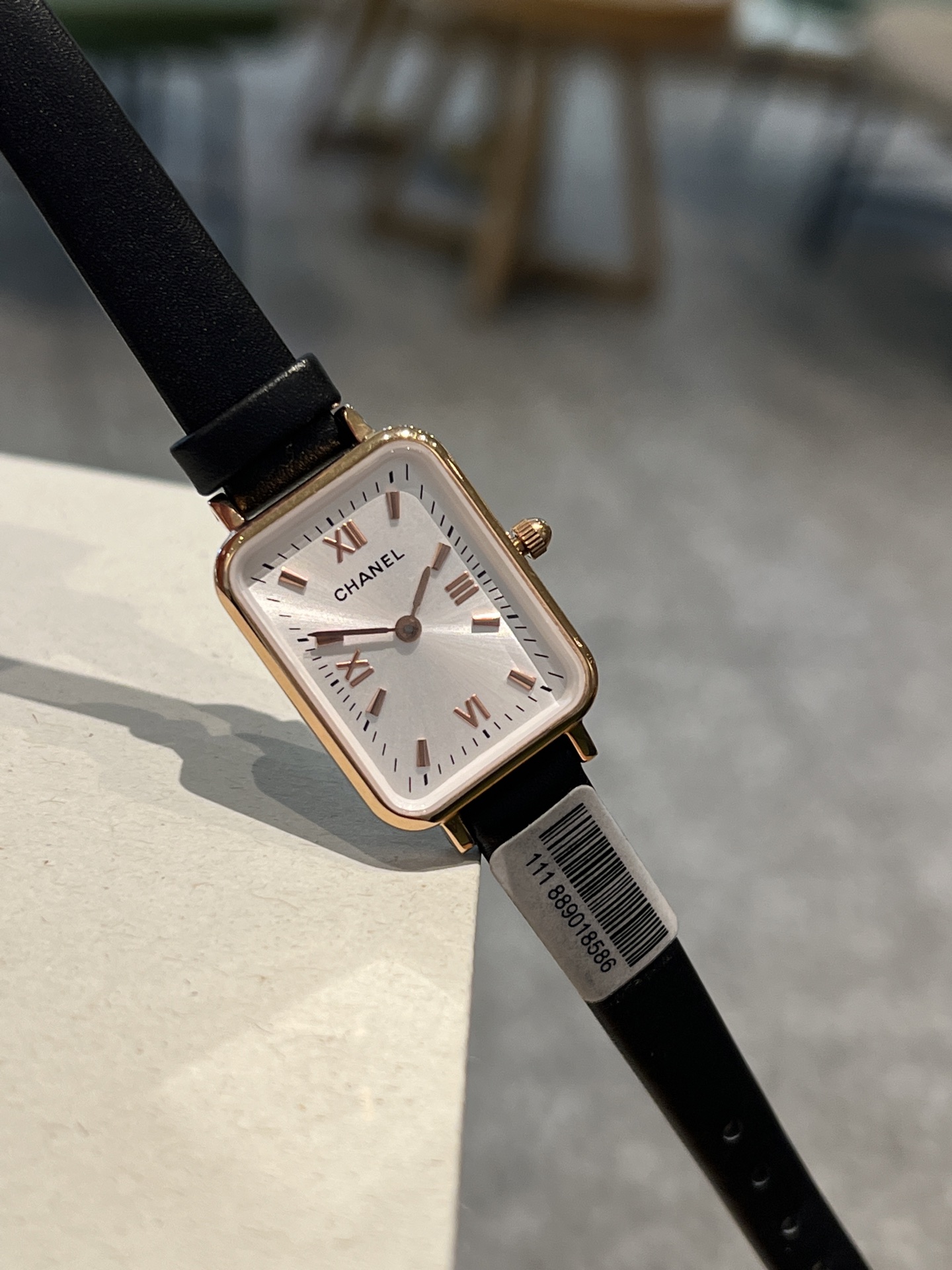 Chanel Premiere-style rectangular watch rose gold-tone case, white dial, black leather strap 26mm Women's Quartz