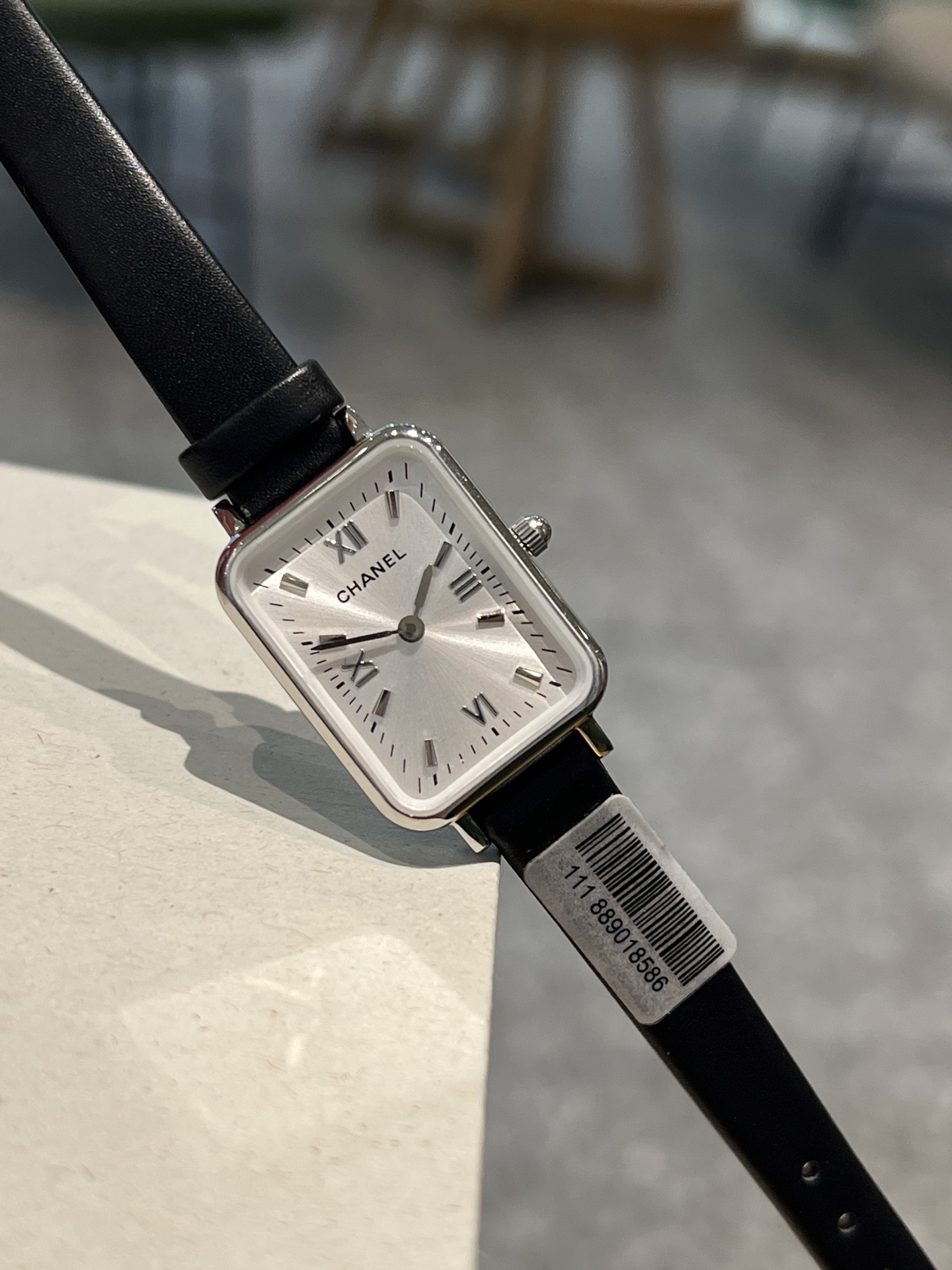 Chanel Premiere-style rectangular watch rose gold-tone case, white dial, black leather strap 26mm Women's Quartz