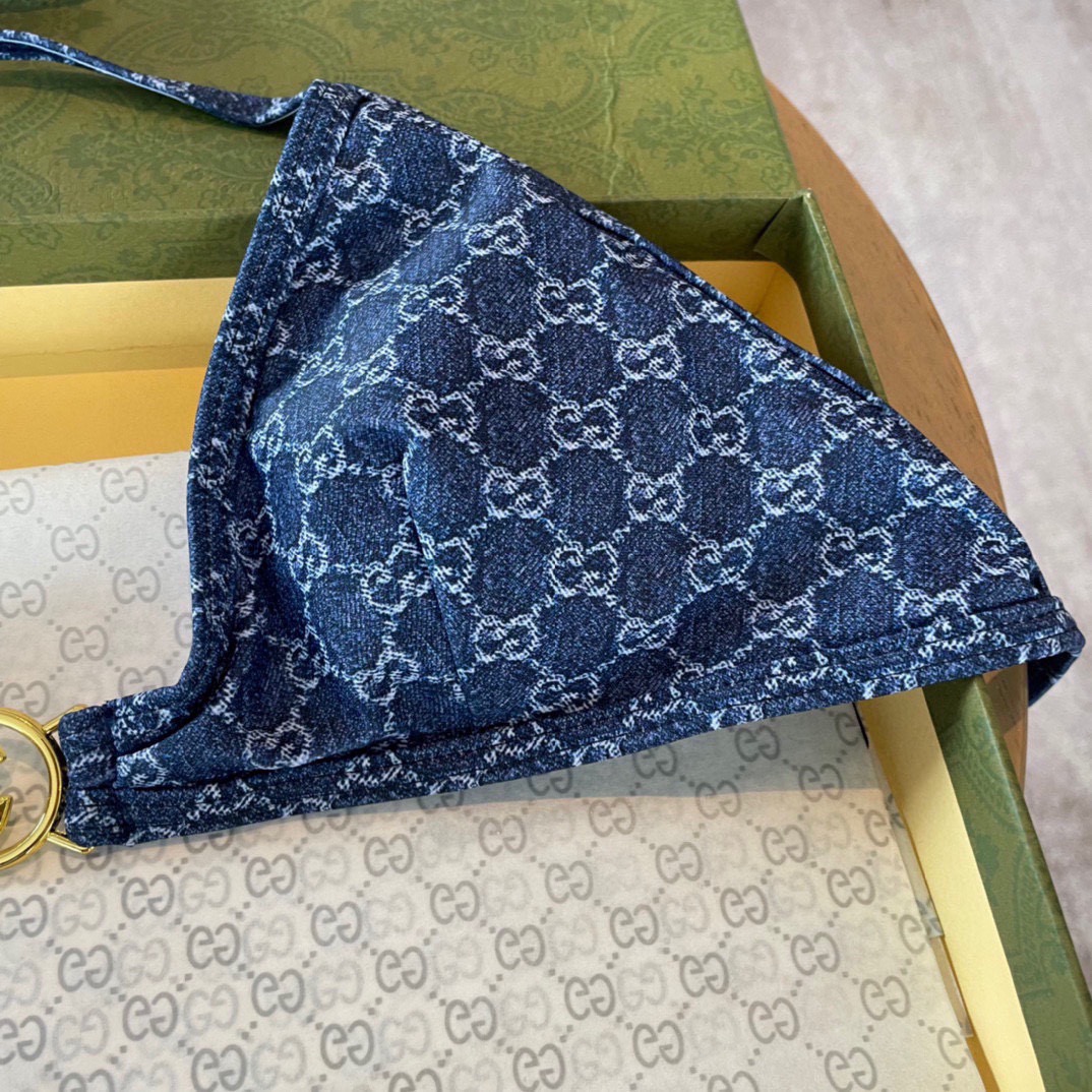 P105 Gucci古奇新款比基尼泳衣👙❤️😍🥰适合多种场景的游泳衣🏊&zwj;♀️海边 游泳池 温泉 水上乐园 漂流都可以😌内搭外穿也完全可以 
面料：透气舒适。速干弹性的游泳衣更加帖肤易清洗
码数：S M L Xl
