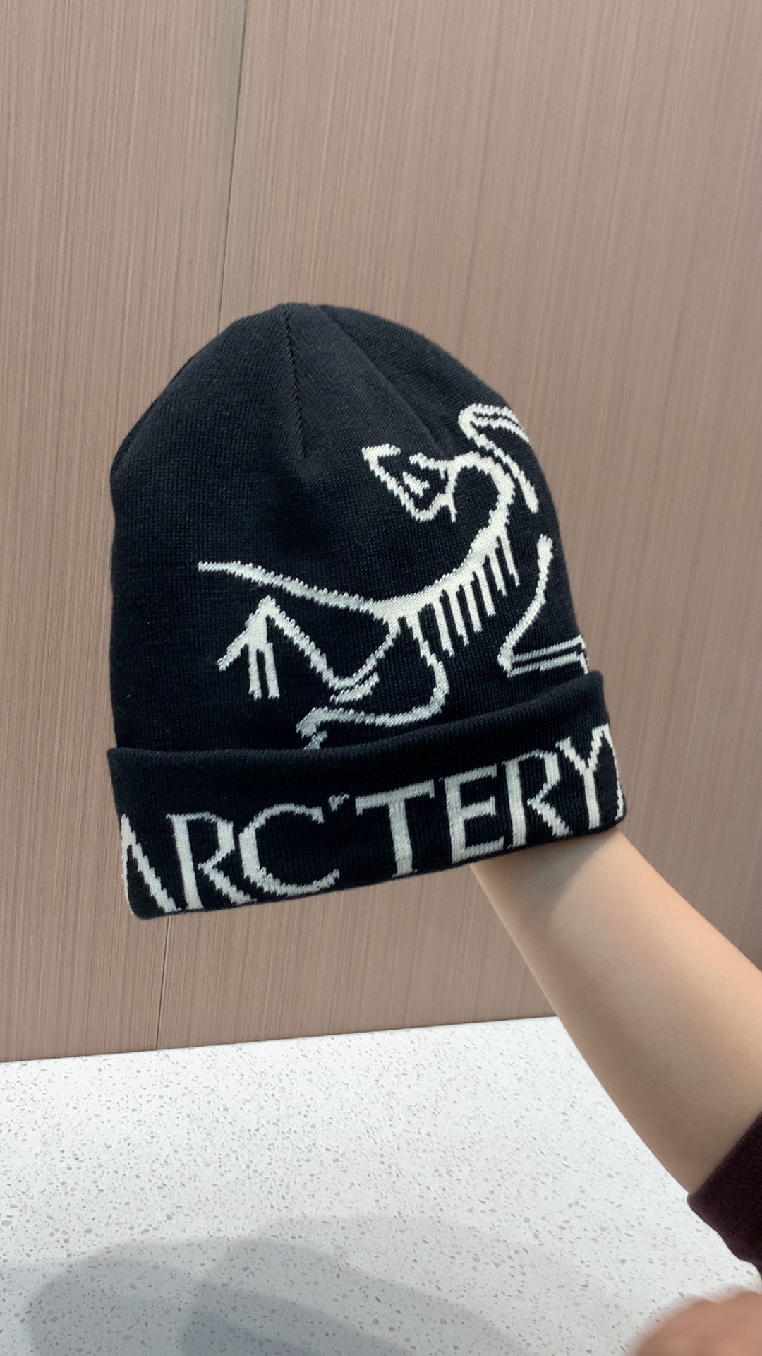 The three-dimensional hat is woven in one piece and sewn at the top - Hat