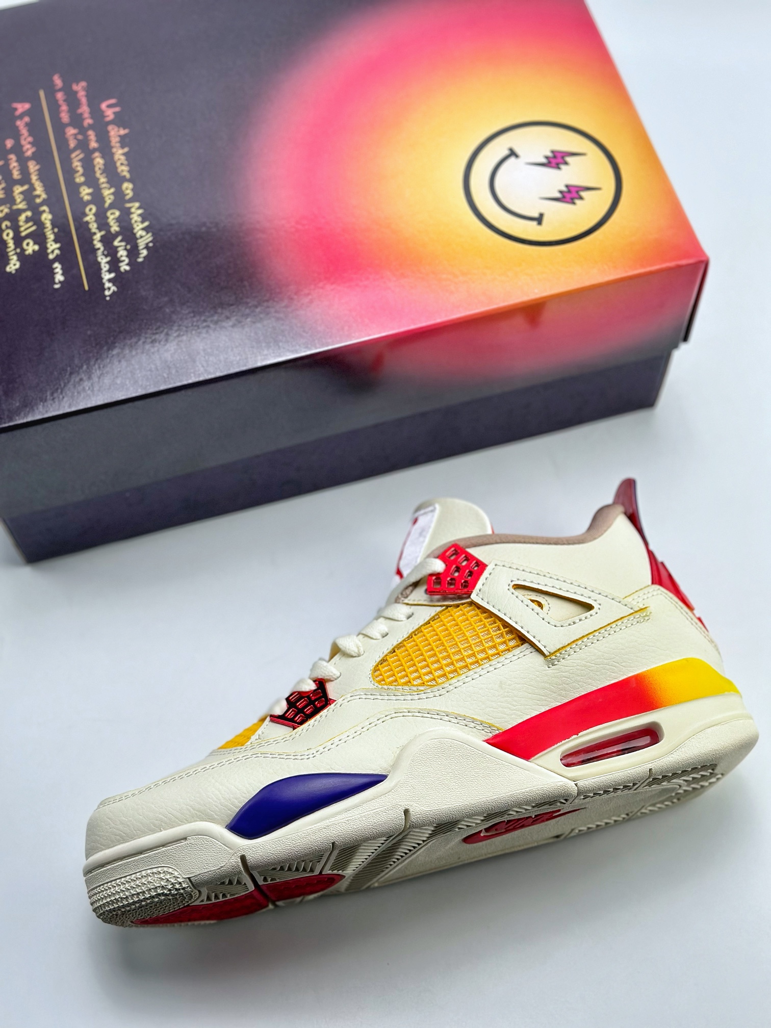 Air Jordan 4 Retro x J Balvin joint smiley face white, blue and red FN0344-901