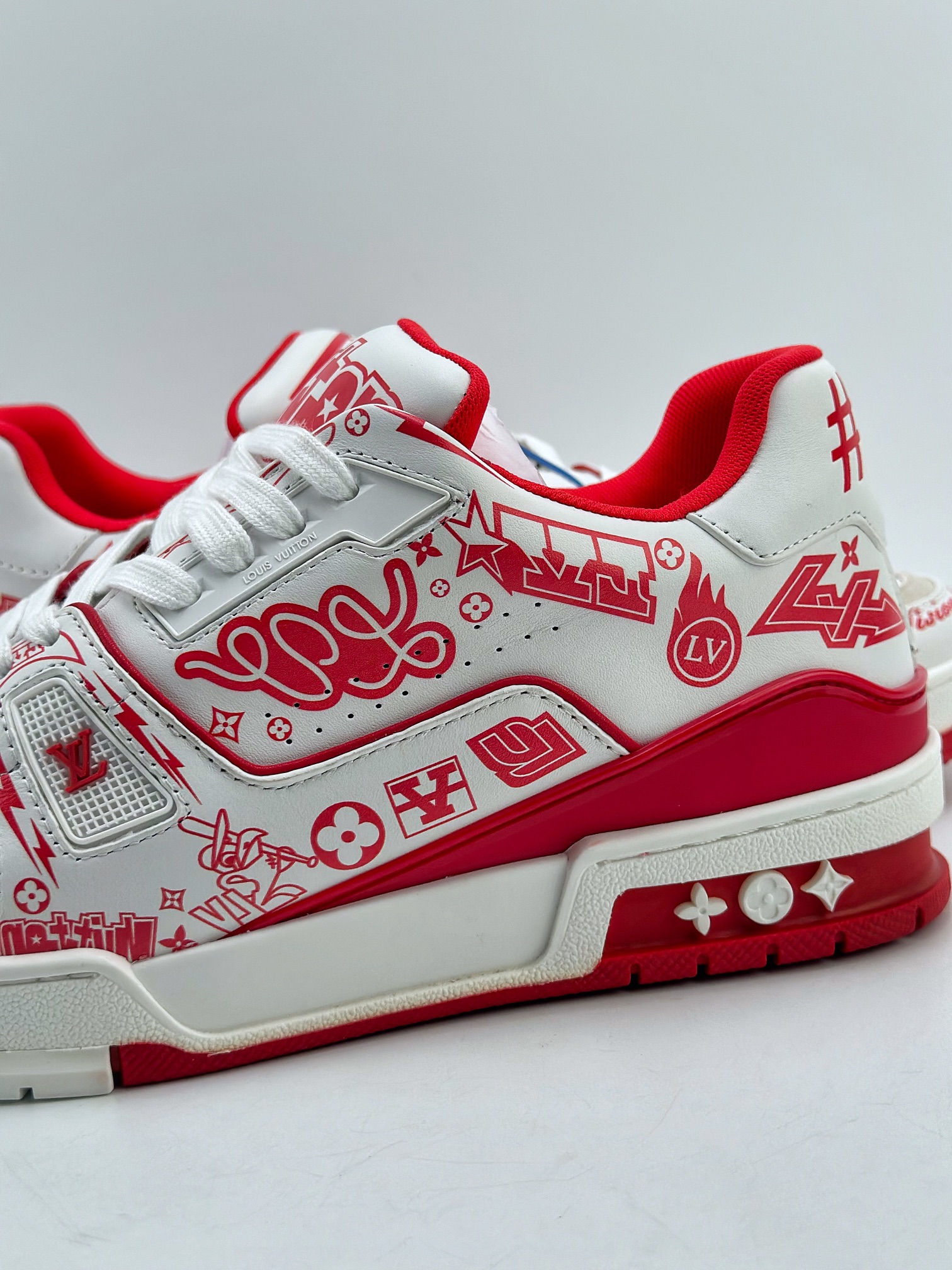 The Louis Vuitton Trainer sneakers are crafted from supple white 9