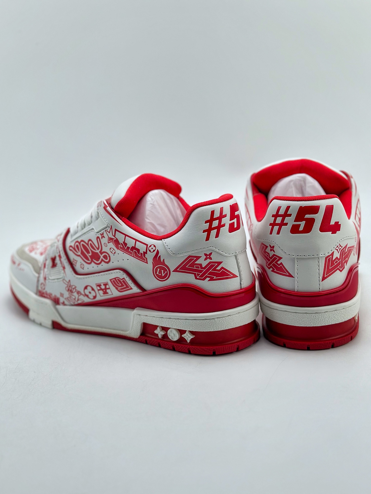 The Louis Vuitton Trainer sneakers are crafted from supple white 5