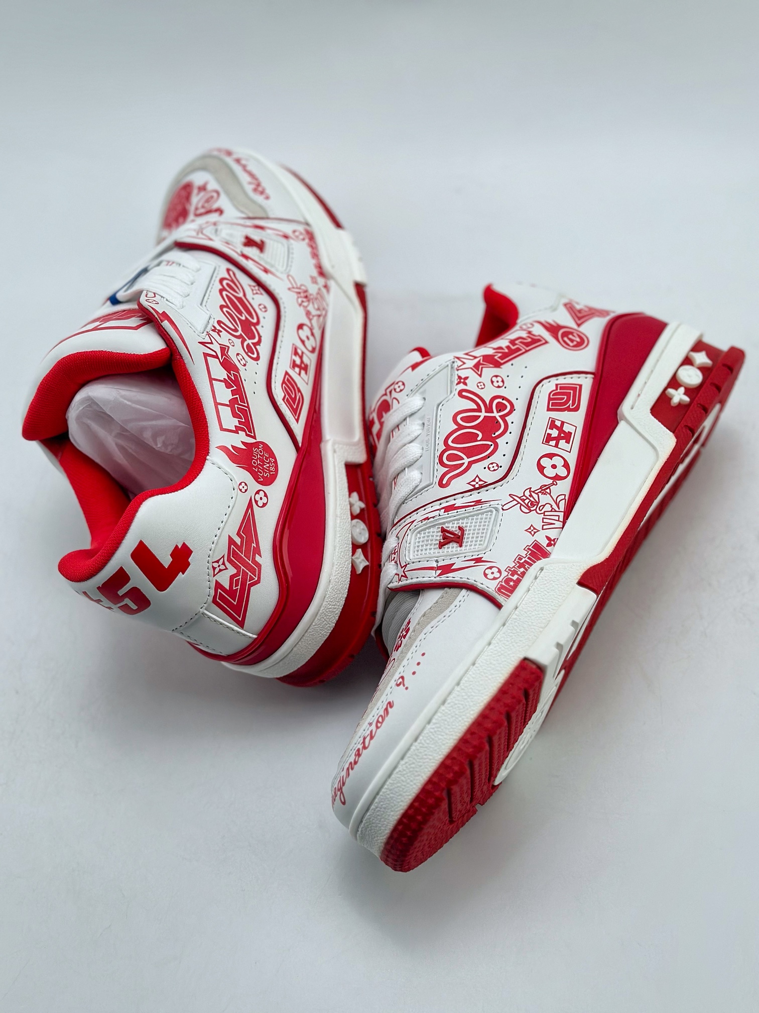 The Louis Vuitton Trainer sneakers are crafted from supple white 3