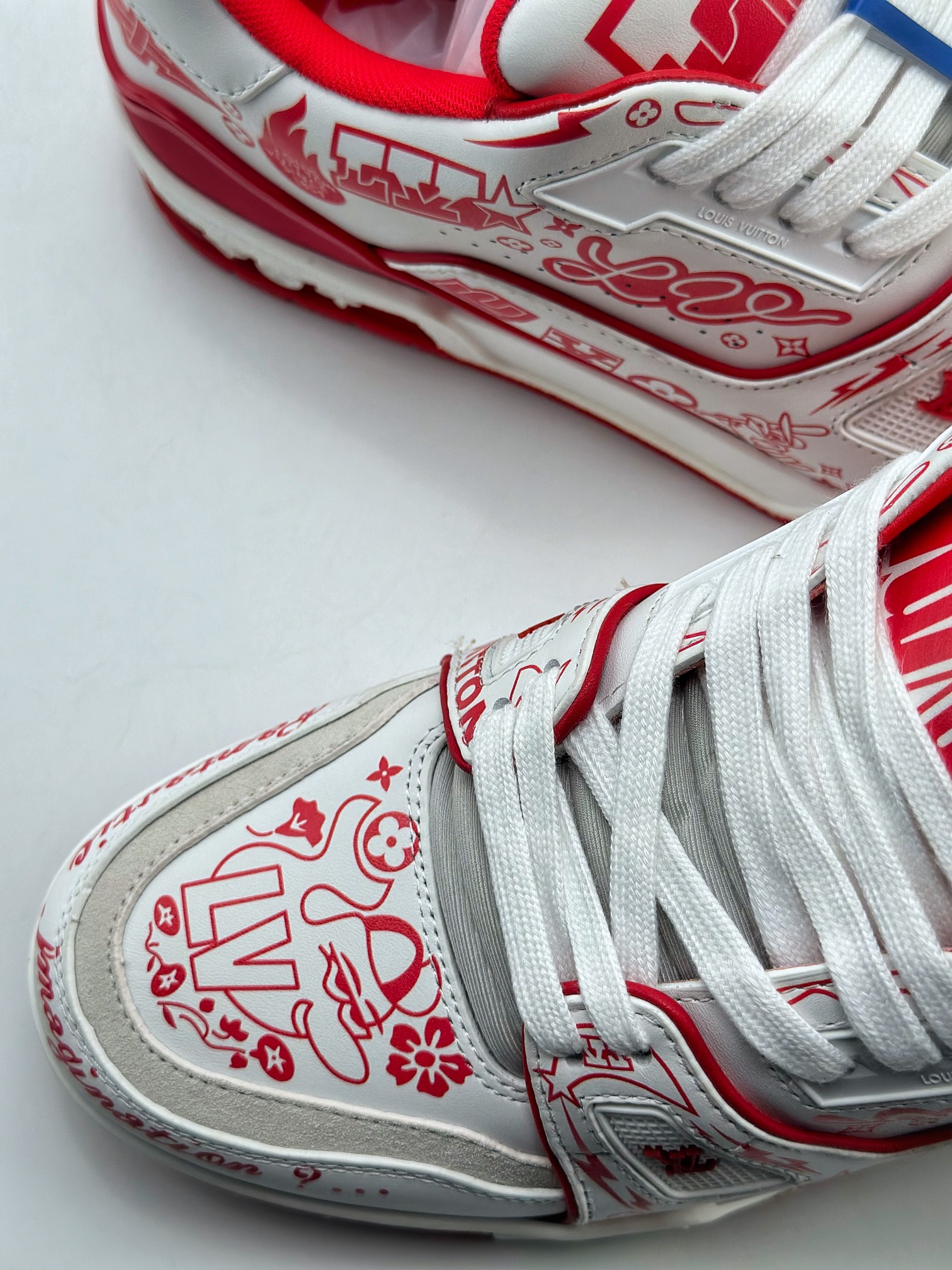 The Louis Vuitton Trainer sneakers are crafted from supple white 8