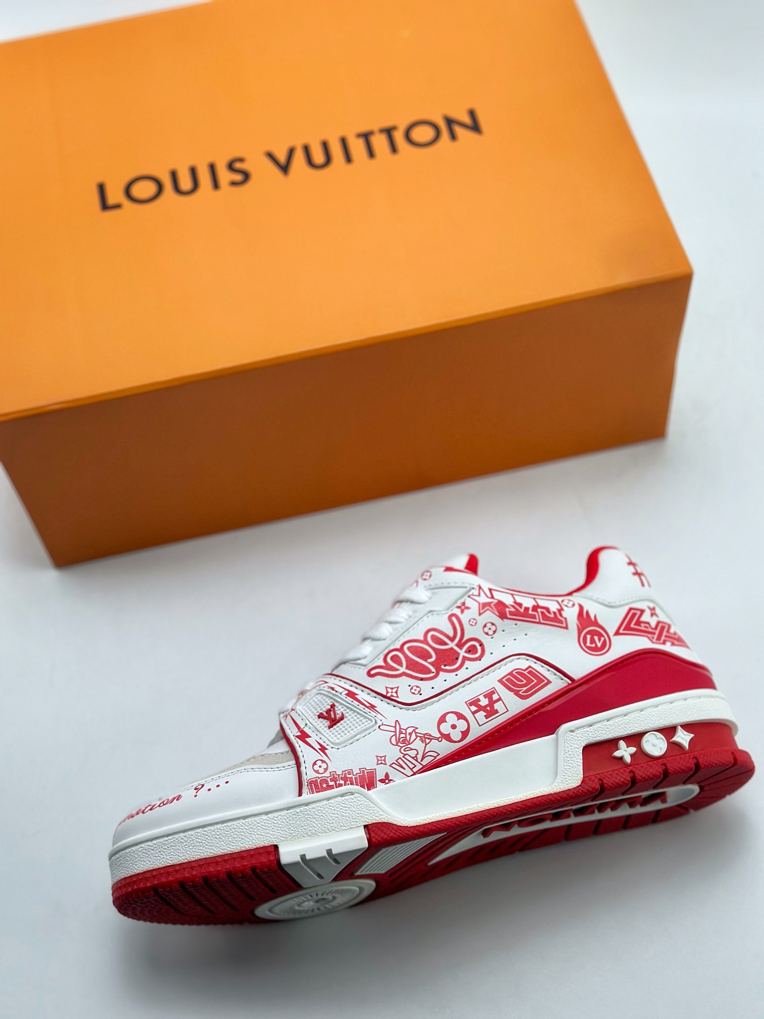 The Louis Vuitton Trainer sneakers are crafted from supple white 7