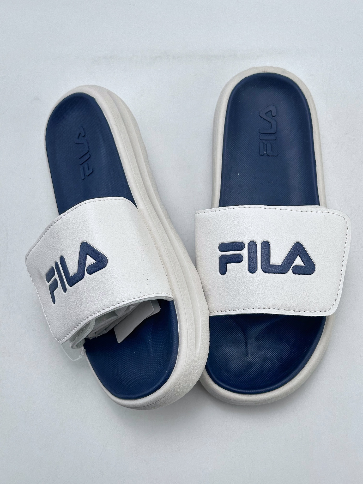 100 FILA 斐乐 夏季新款 白蓝 摩登甜甜圈系列魔术贴休闲沙滩拖鞋 1SM01946E 950 240