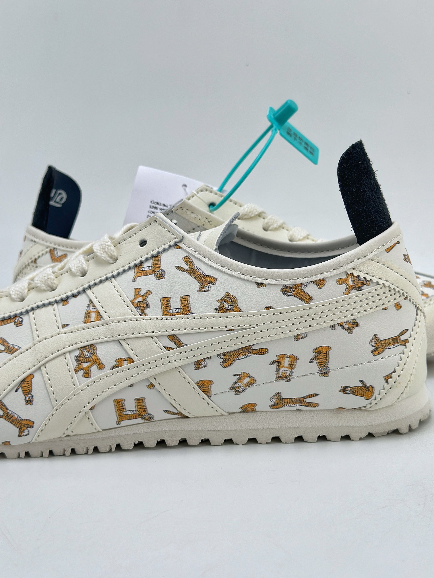 150 Onitsuka Tiger Mexico 66 Paraty 老虎满印 百搭单品 板鞋 1183B785-100