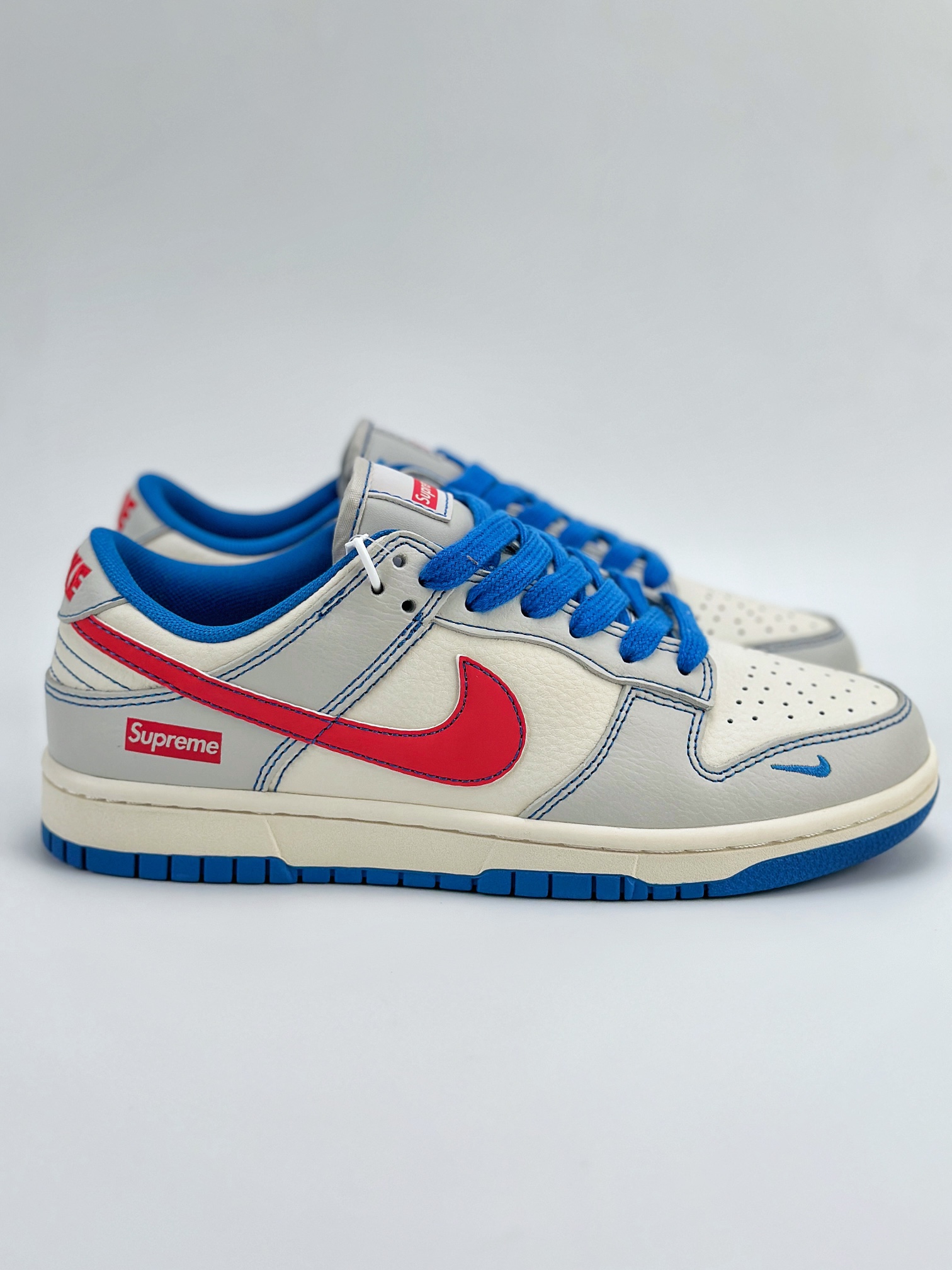 NIKE SB Dunk Low x Supreme 白蓝红小钩 XX9191-002