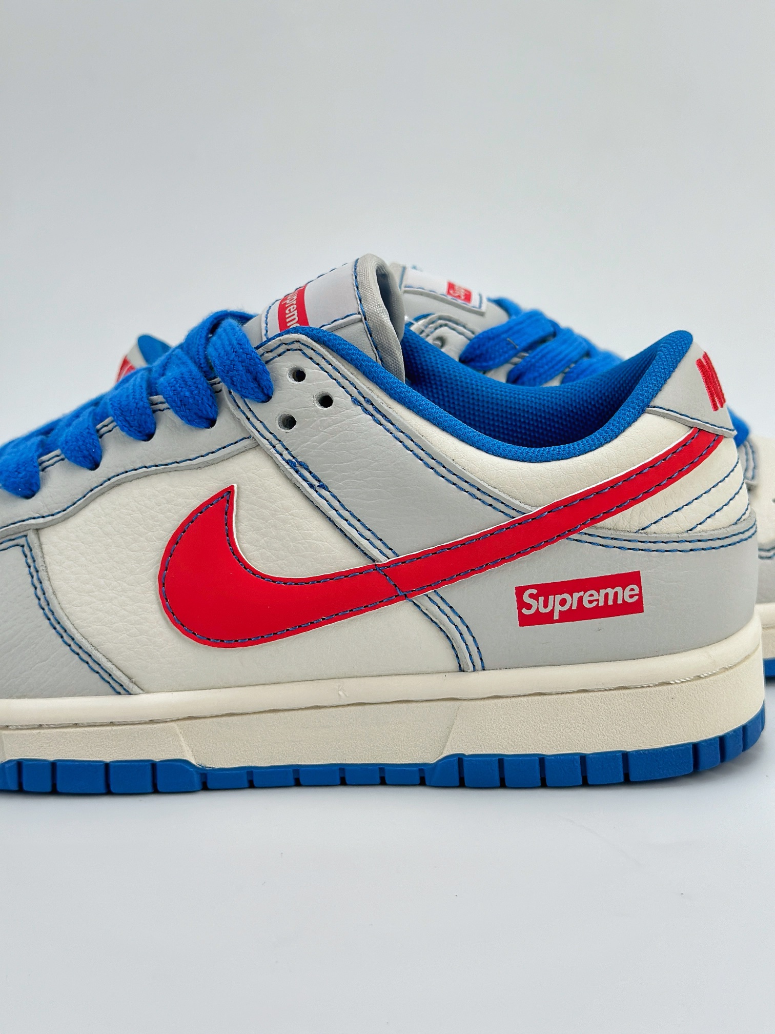 NIKE SB Dunk Low x Supreme 白蓝红小钩 XX9191-002