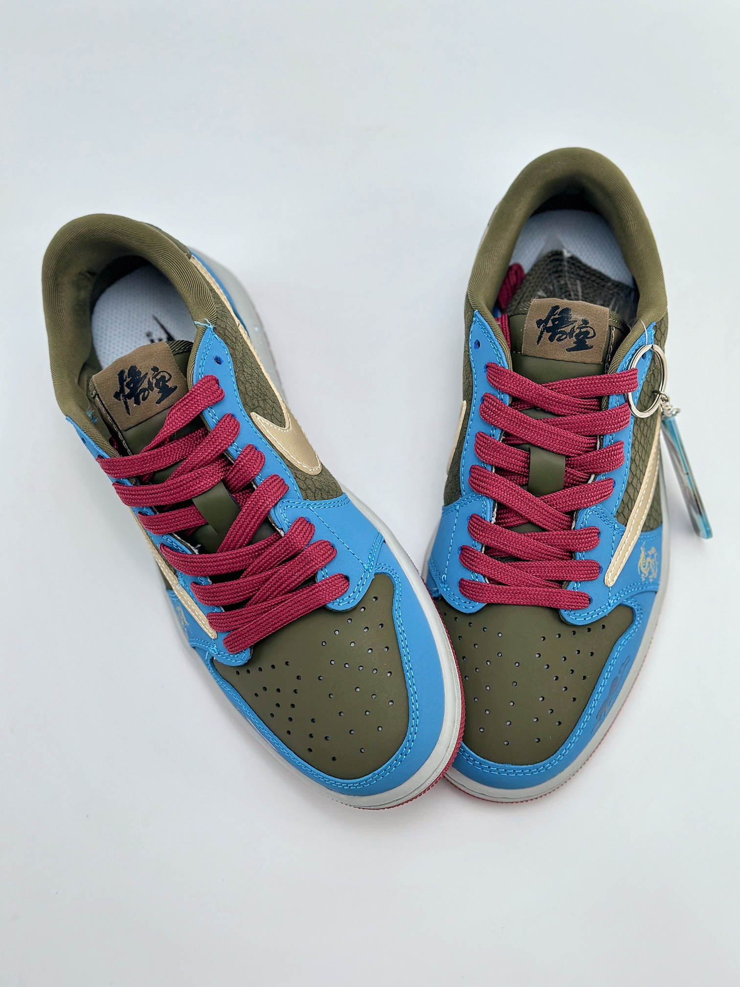 Travis Scott x Nike Air Jordan 1 Low x 黑神话悟空 直面天命 蓝黄绿 Air Jordan 1 Low 反转蓝黄绿倒钩 CH6336-015