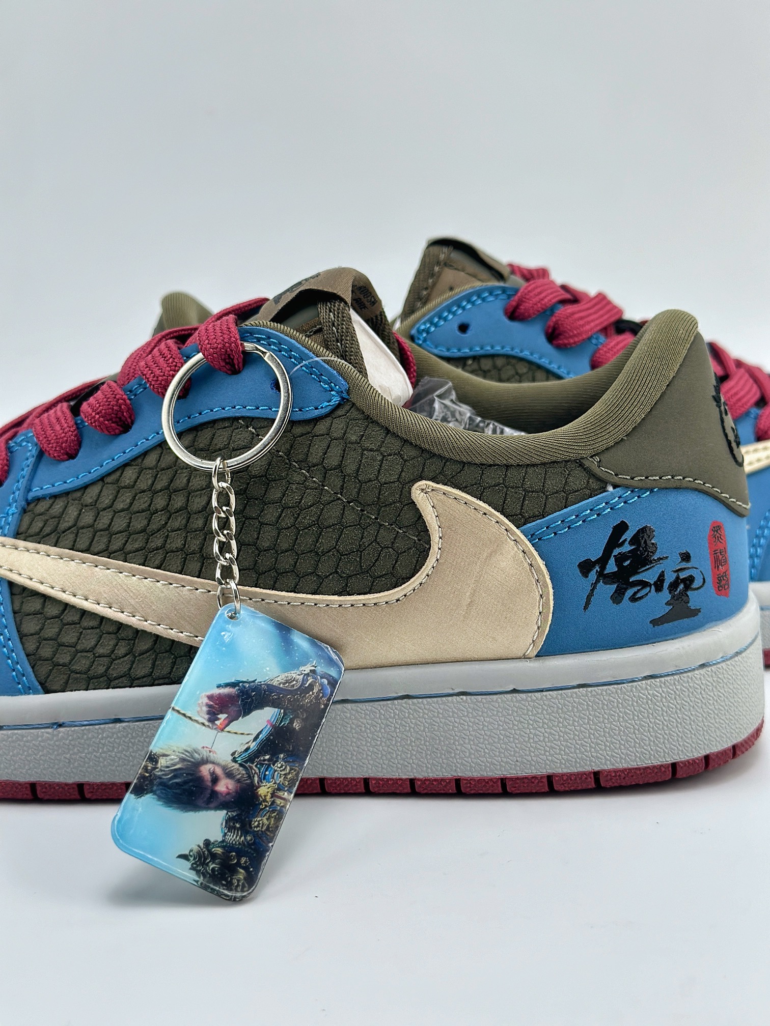 Travis Scott x Nike Air Jordan 1 Low x 黑神话悟空 直面天命 蓝黄绿 Air Jordan 1 Low 反转蓝黄绿倒钩 CH6336-015