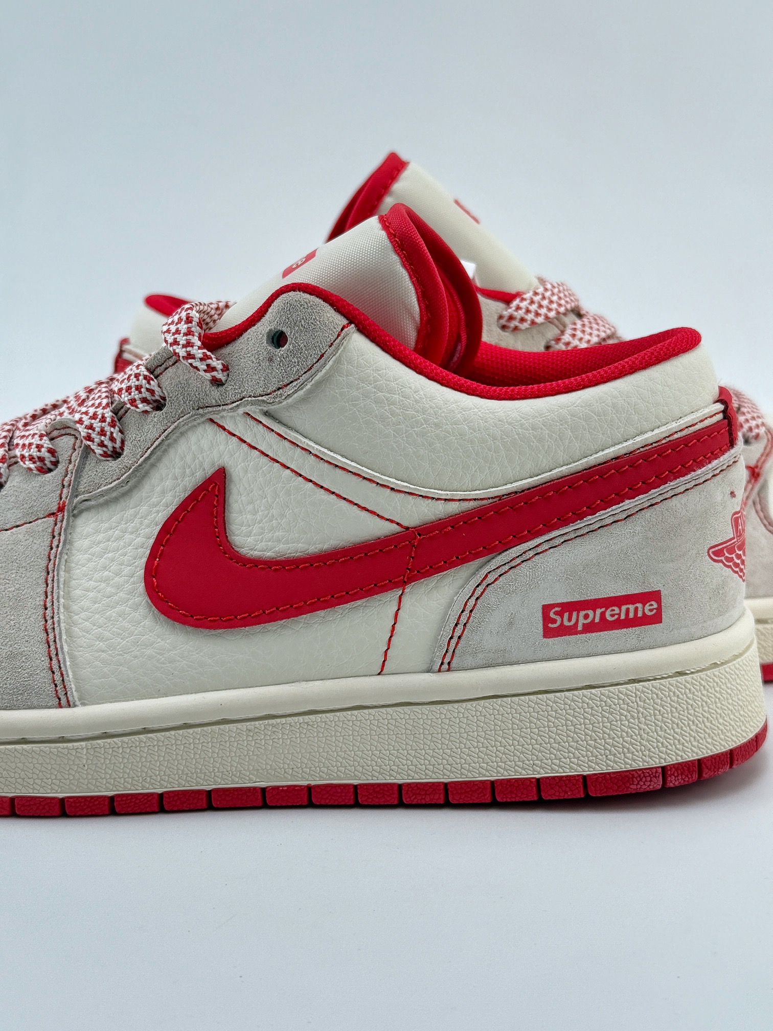 Air Jordan 1 Retro Low x Supreme 米红小钩满天星  XX2409-009