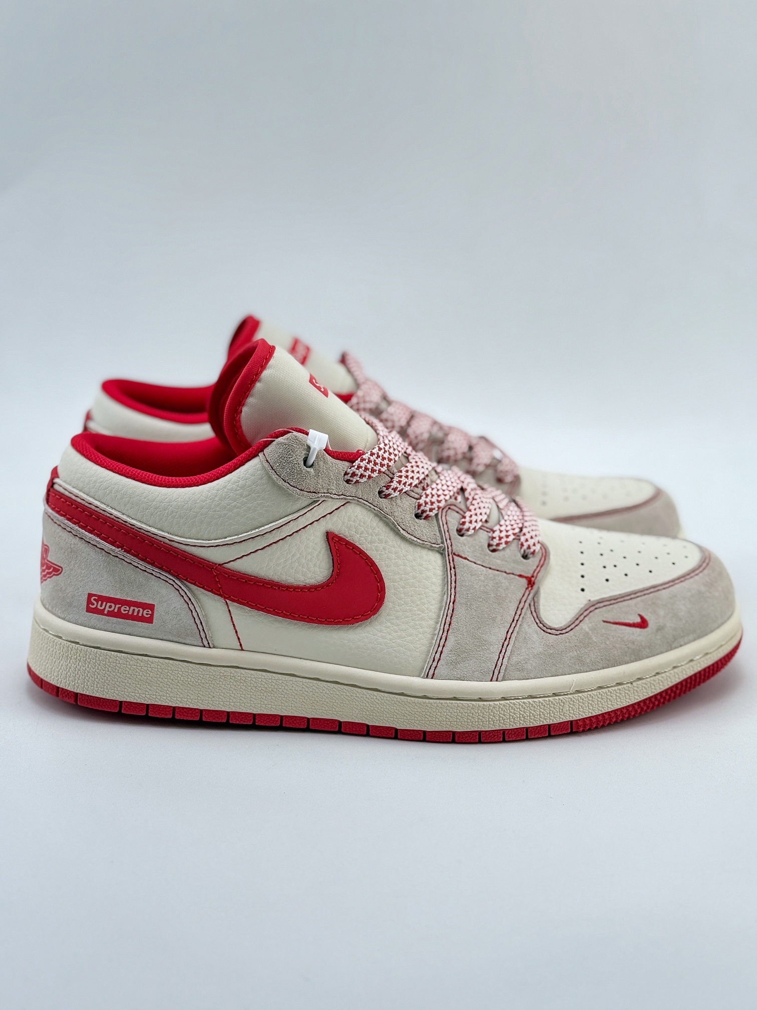 Air Jordan 1 Retro Low x Supreme 米红小钩满天星  XX2409-009