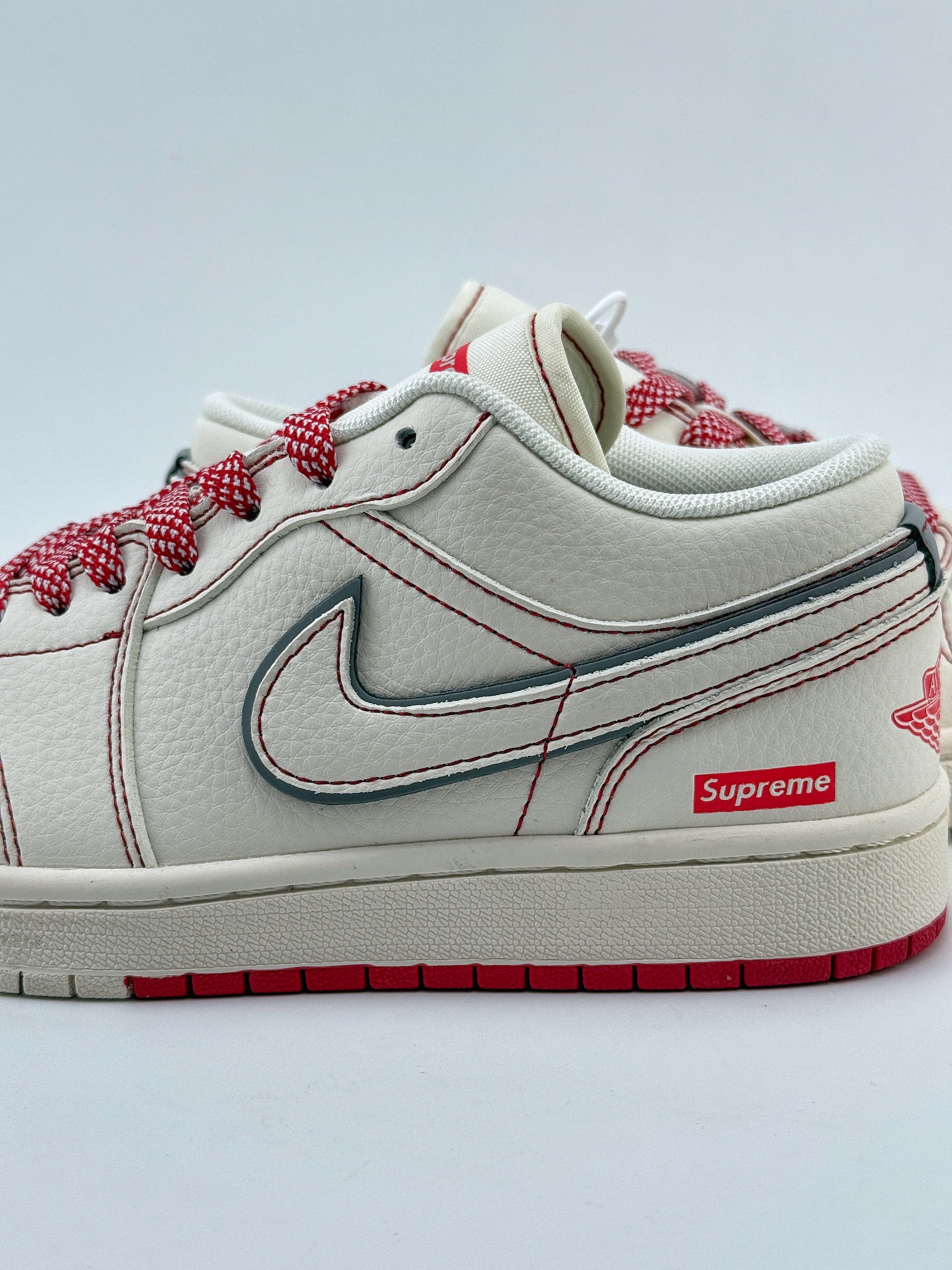 Air Jordan 1 Retro Low x Supreme 米红满天星 SJ9950-025