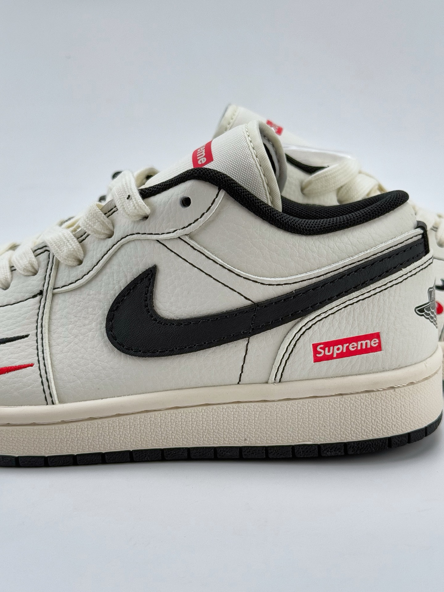 Air Jordan 1 Retro Low x Supreme 白黑双小钩 XX3318-108