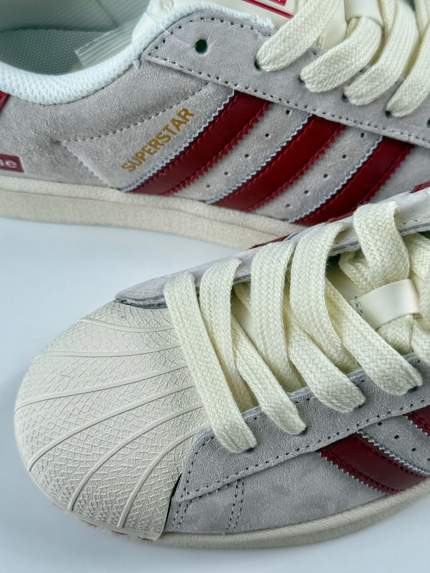 220 AD Originals Superstar x Supreme 灰红  BZ2526