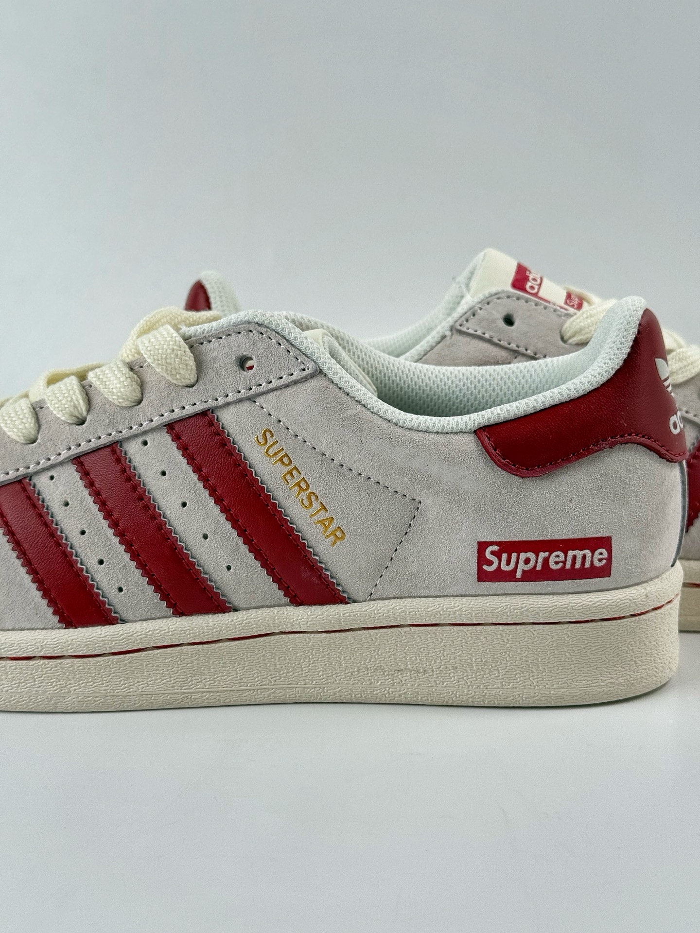 220 AD Originals Superstar x Supreme 灰红  BZ2526