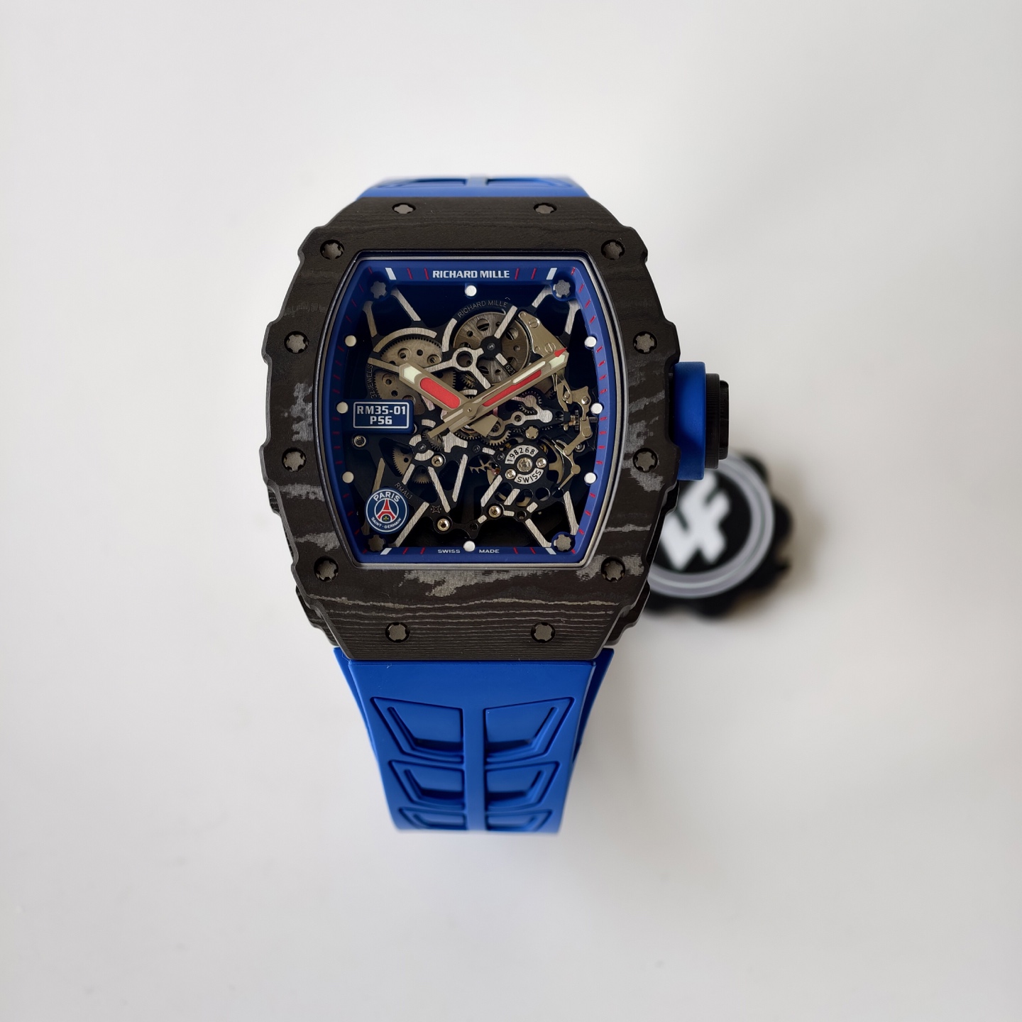 NO:764756,Produced by ZF RM35-01｜SG Paris Saint-Germain's famous special model, making a grand debut with the World Cup fever!  The case data is 43×50×14mm. It is made of RM’s special Carbon TT carbon fiber process. It is made of multiple layers of ultra-thin carbon fiber filaments staggered and laminated. It is ultra-light and impact-resistant and the pattern formed is unique. Movement: Customized version of Caliber RMAL1 hollow self-winding integrated movement with 55 hours of power reserve. The entire body is made of titanium alloy, taking into account both lightweight and stable properties. Glass The curved mirror focuses on high transparency +  The light purple anti-glare treatment can truly show the layering of the hollow movement. The strap + buckle is made of FKM fluorine rubber, combined with vulcanization process, the buckle is made of titanium alloy, and the RMLOGO is very delicate. The best selling point - the SG logo at seven o'clock on the front of the glass, paired with the SG embossed badge in the middle of the back, echoing the front and back, making the recognition and theme of the entire watch more complete.  Put it on and welcome the passionate atmosphere of the World Cup together!  ,19860909ZF 出品 RM35-01｜SG 巴黎圣日耳曼联名特别款,伴随世界杯热潮重磅登场！ 表壳数据43×50×14mm 采用RM专用的Carbon TT 碳纤维工艺打造,由多层超薄碳纤维丝交错叠压而成,特性是超轻、抗冲击而形成的花纹是独一无二的. 机芯 定制版Calibre RMAL1镂空自动上链一体机芯,拥有55小时动力储存,整体由钛合金打造,兼顾轻量化、和稳定属性. 玻璃 弧形的镜面重点在于高通透 + 轻紫色防眩光处理,这样才能把镂空机芯的层次感真正呈现出来. 表带+扣 表带采用FKM 氟橡胶,并结合硫化工艺处理,表扣采用钛合金,RMLOGO的刻字非常细腻. 最佳卖点—— 玻璃正七点位的 SG 标识,搭配背部中间的 SG 浮雕徽章,正反两面前后呼应,让整只表的辨识度和主题感都更完整. 快戴上它,一起去迎接世界杯的热血氛围吧！,,Watch