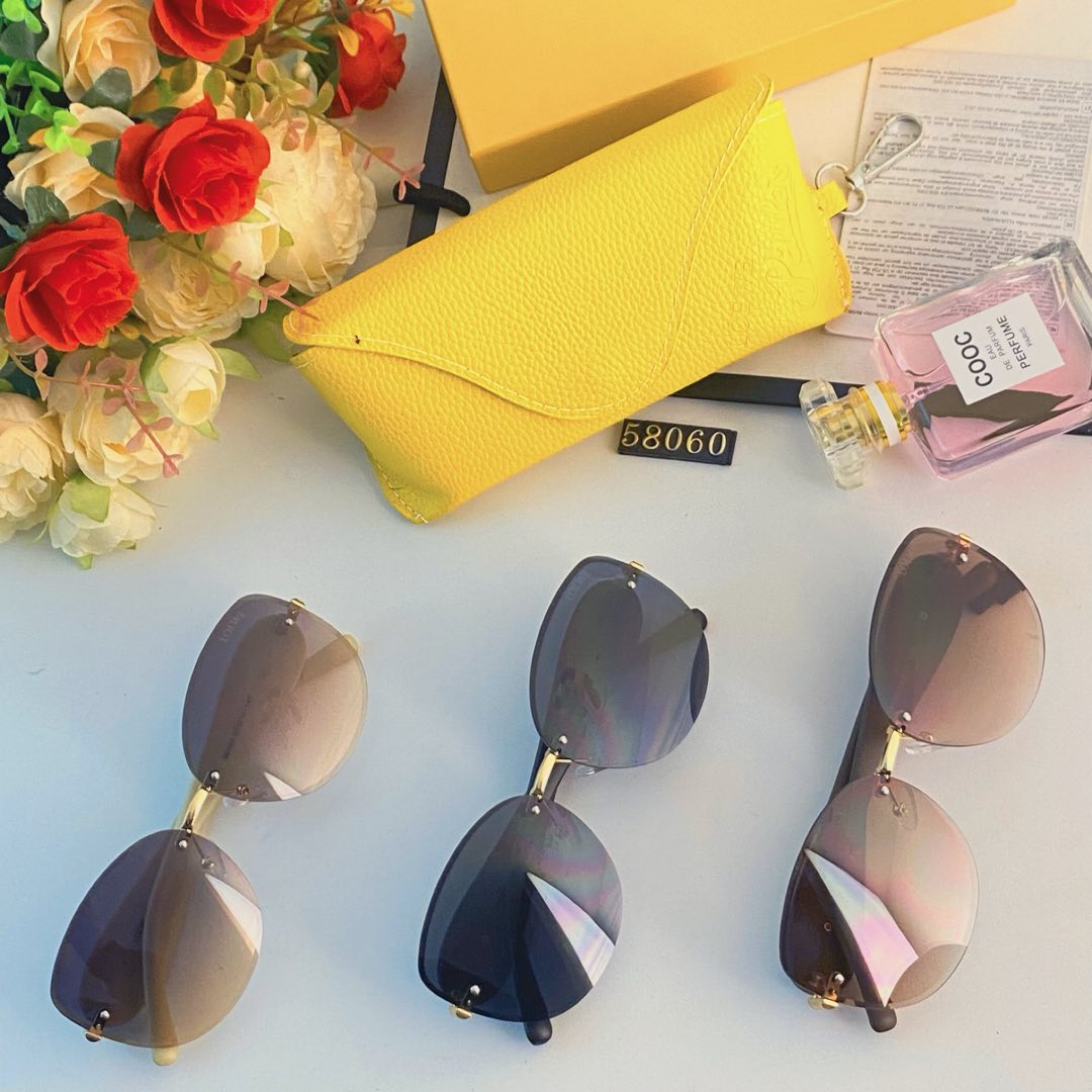 NO:269521,Loew* oval frameless edge-cut sunglasses new UV nylon lens hot girl face showing small sunglasses glasses sunglasses, glasses, loewe19860909Loew*椭圆形无框切边墨镜新款防紫外线尼龙镜片辣妹显脸小太阳镜眼镜墨镜太阳镜,眼镜,loewe,glasses