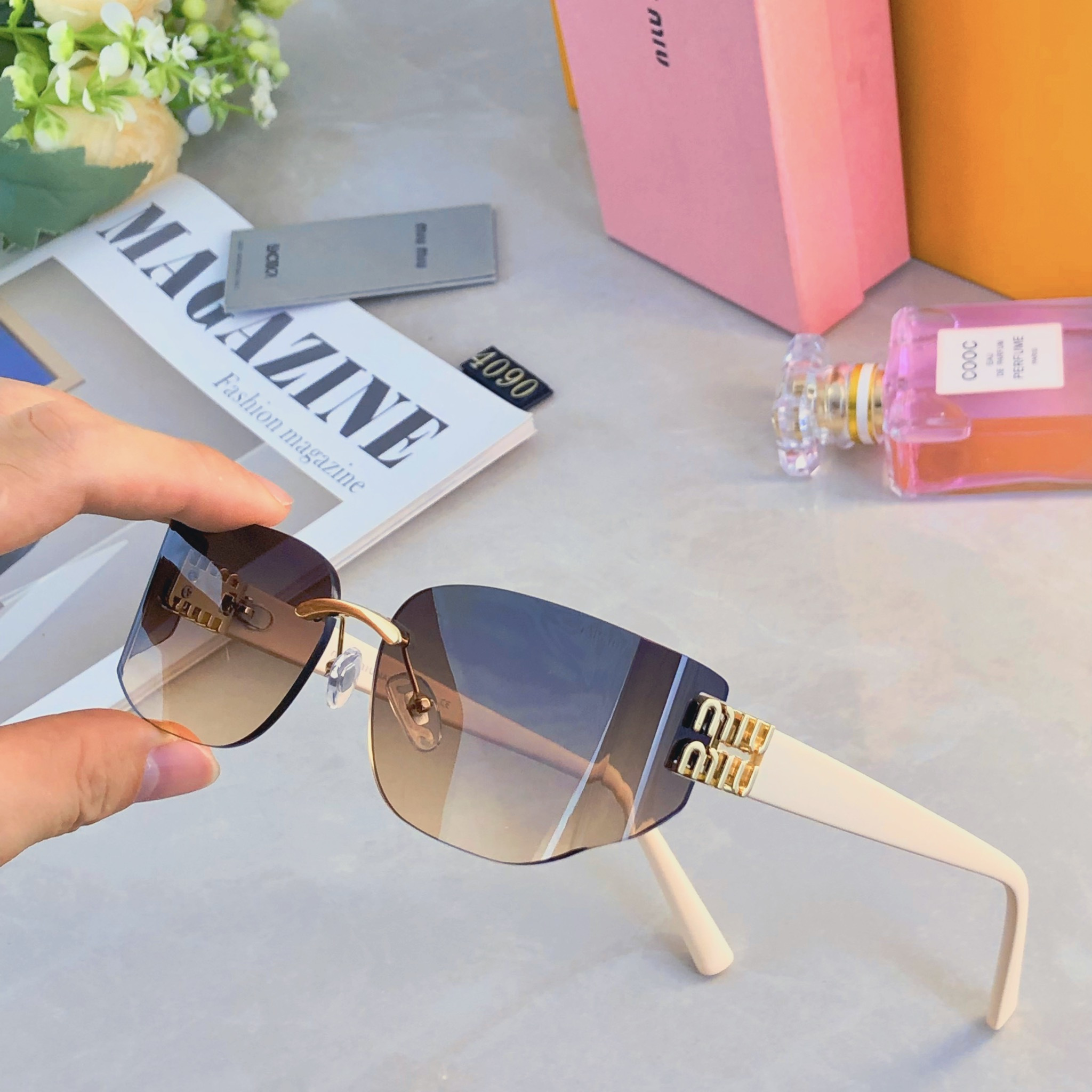 。。miumi*2026新款m 墨镜太阳镜女款高级感无框切边太阳眼镜防晒防紫外线