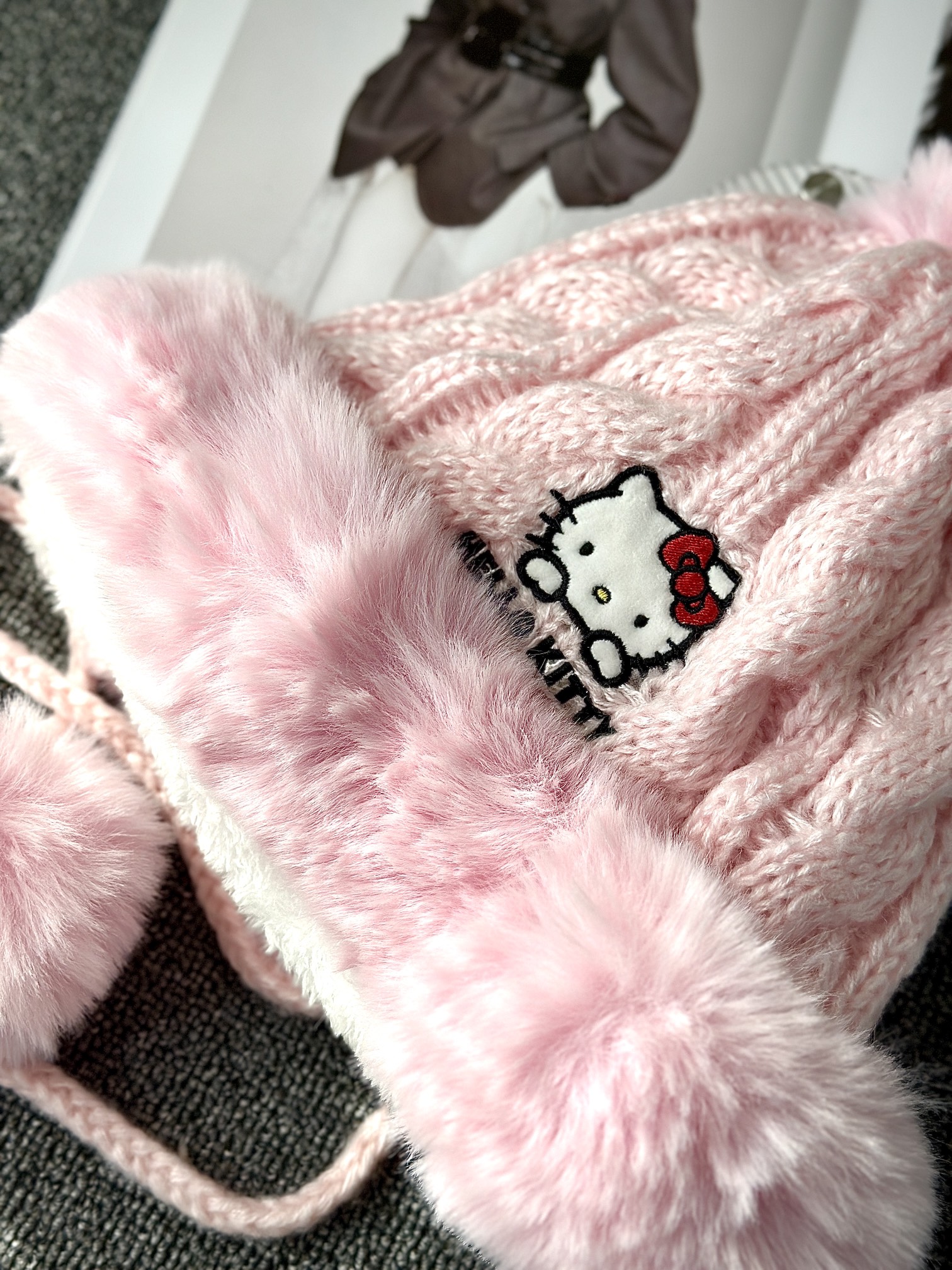 Hello Kitty Pink Pom-Pom Knit Beanie. Crafted from a soft, plush-texture - Comprehensive 6