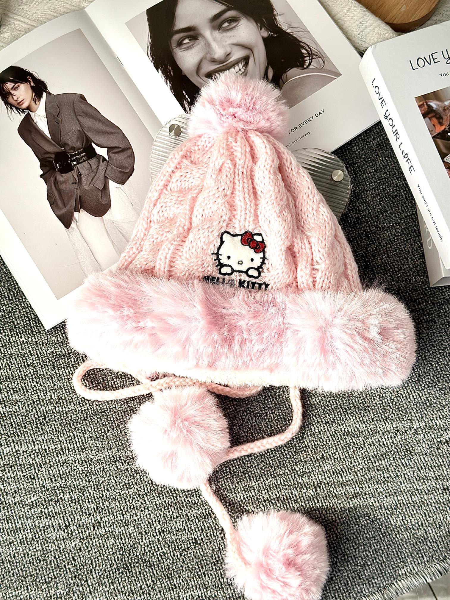 Hello Kitty Pink Pom-Pom Knit Beanie. Crafted from a soft, plush-texture - Comprehensive 2