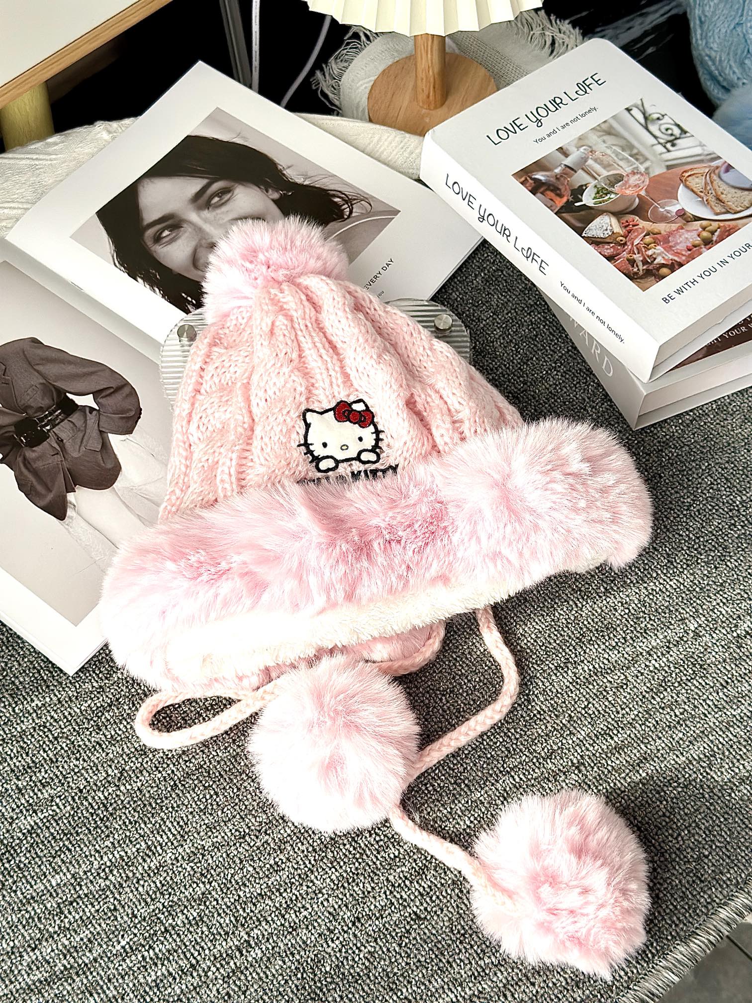 Hello Kitty Pink Pom-Pom Knit Beanie. Crafted from a soft, plush-texture - Comprehensive 4